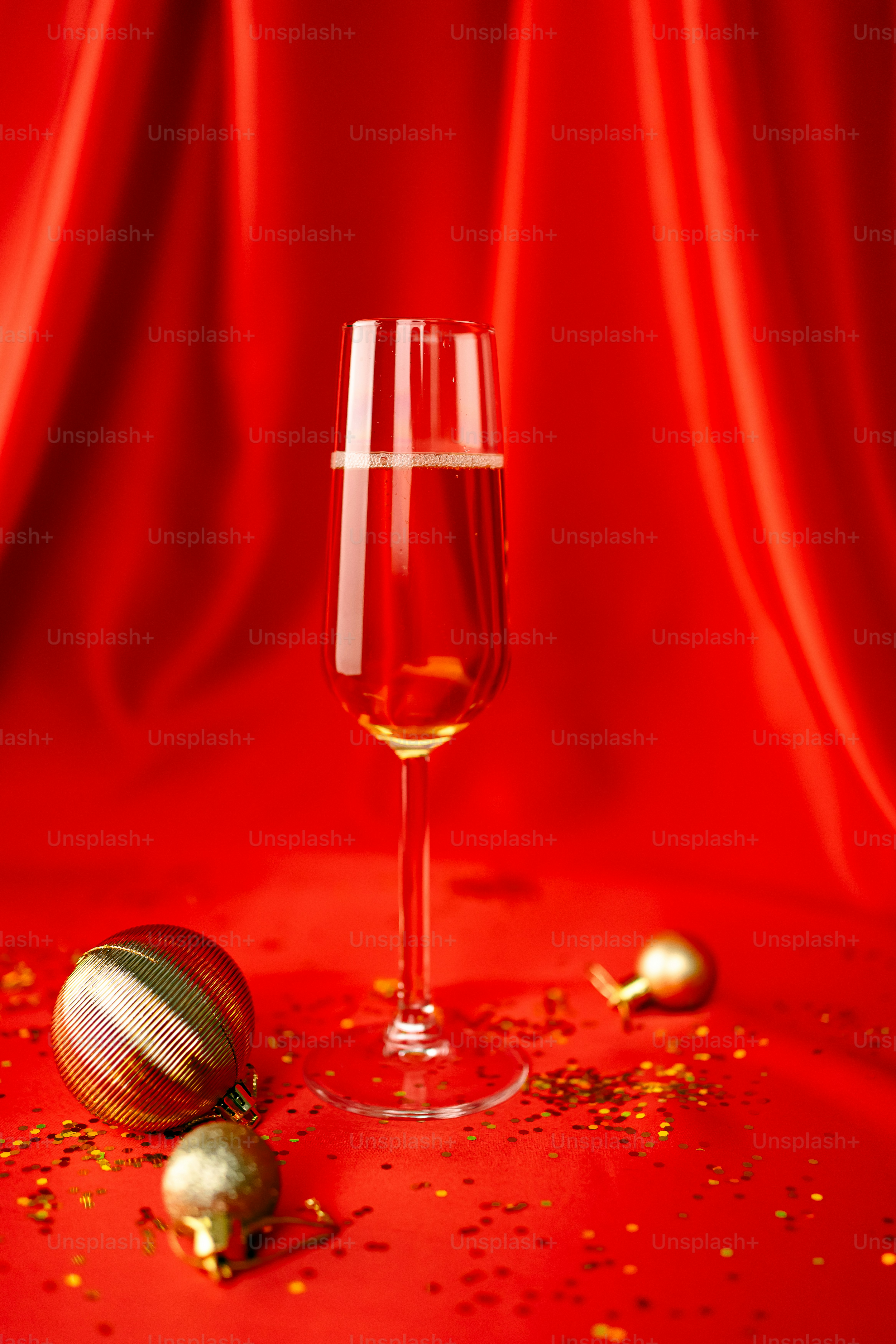 A glass of wine sitting on top of a table