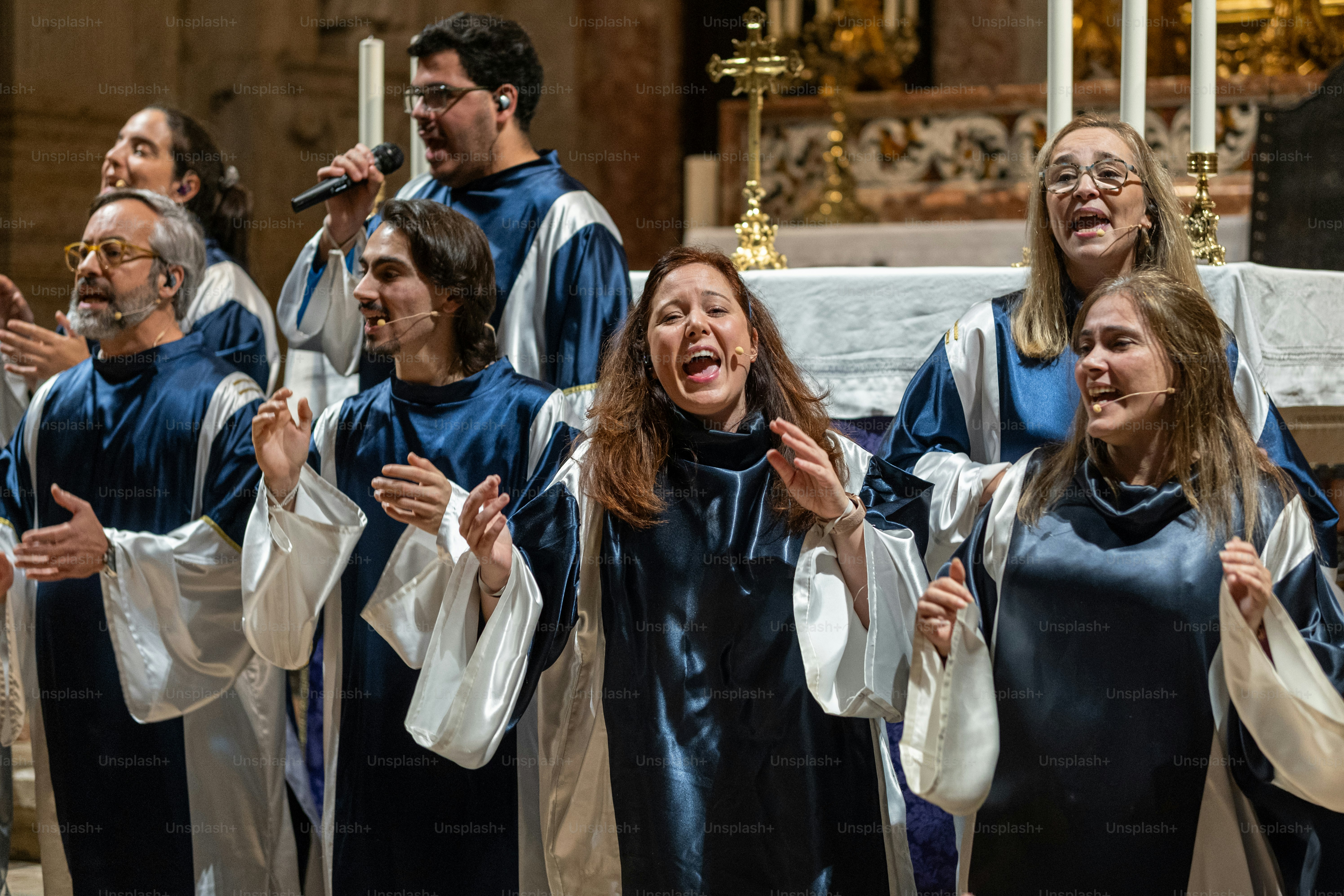 A group of women singing in a church photo – Singer Image on Unsplash
