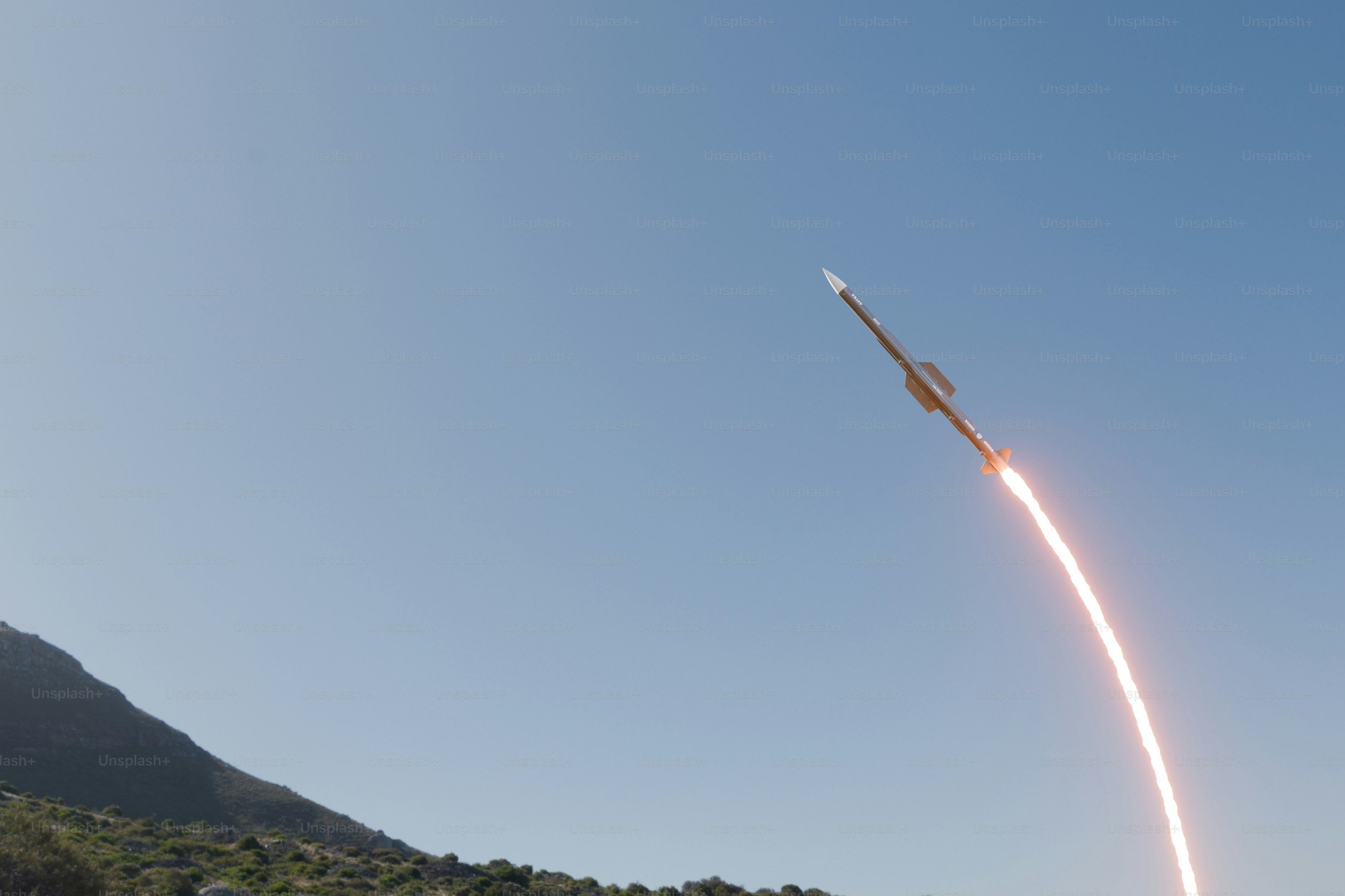 A rocket that is flying through the air