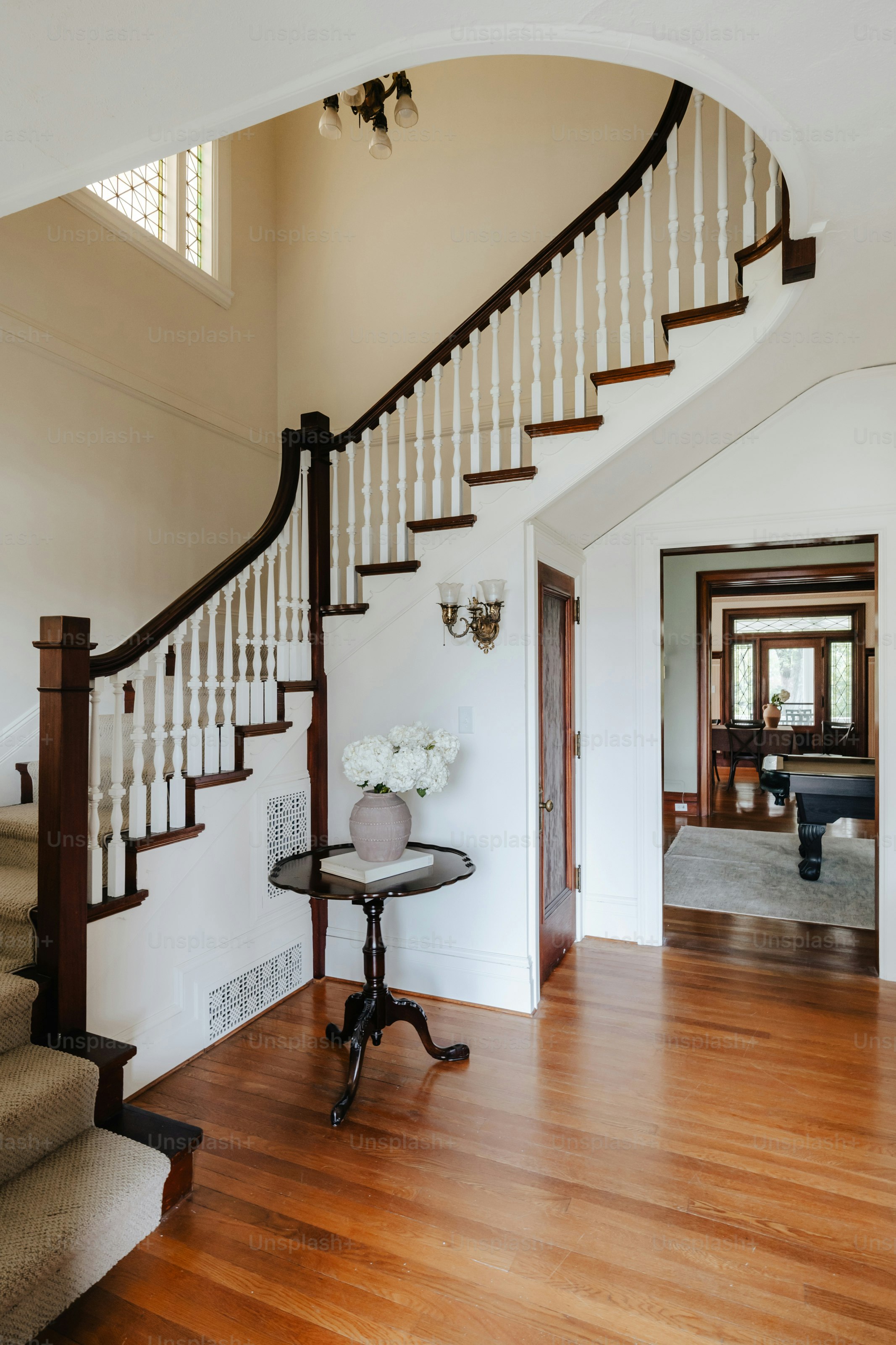 A staircase in a house with wood floors