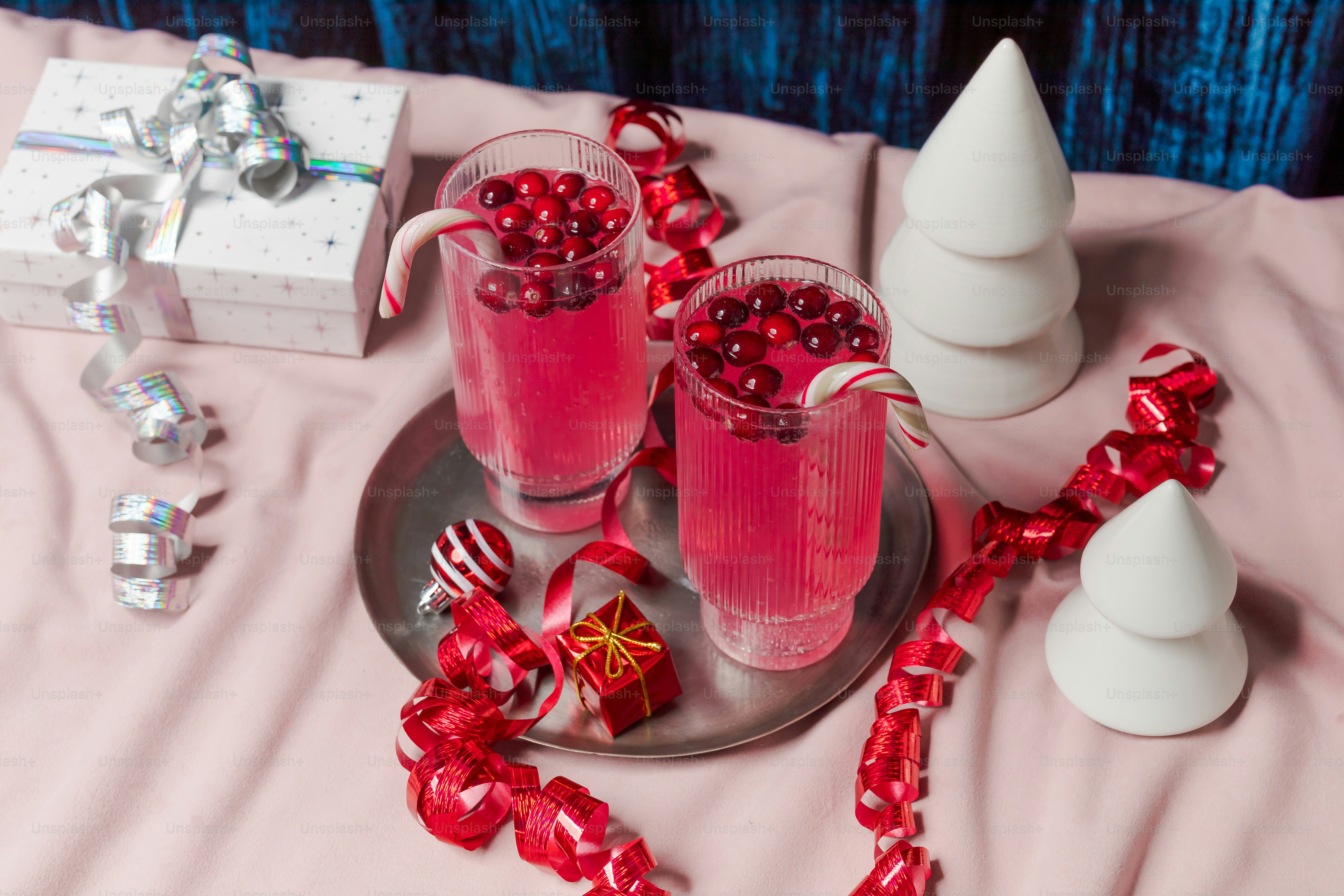 A couple of glasses of wine on a table