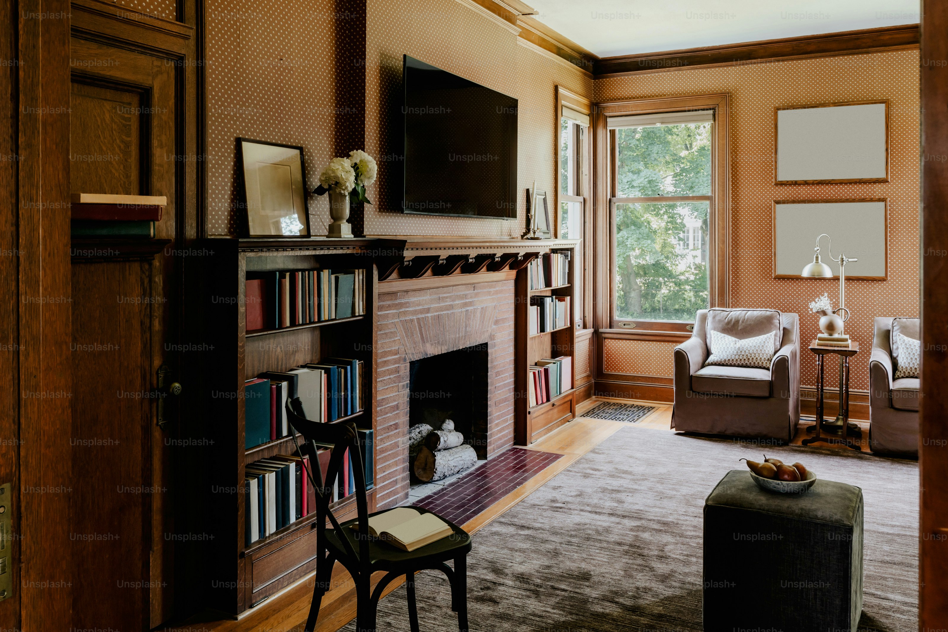A living room filled with furniture and a fire place
