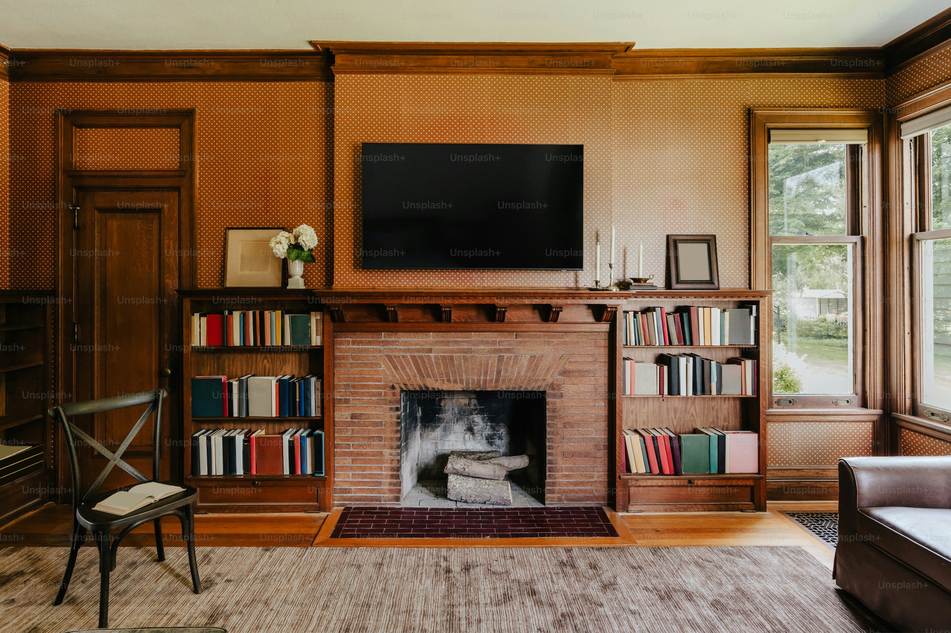 A living room filled with furniture and a fire place