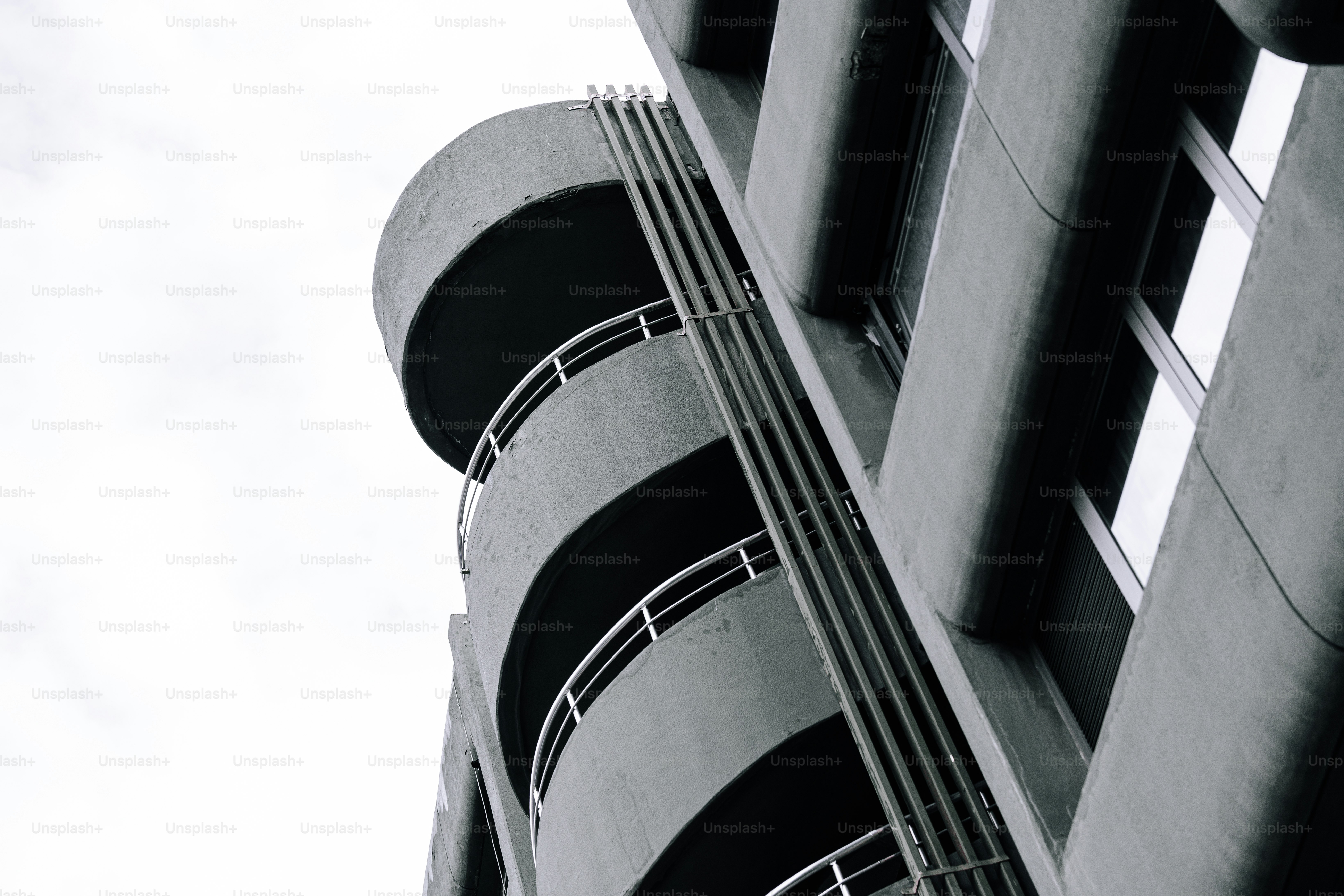 A black and white photo of a tall building