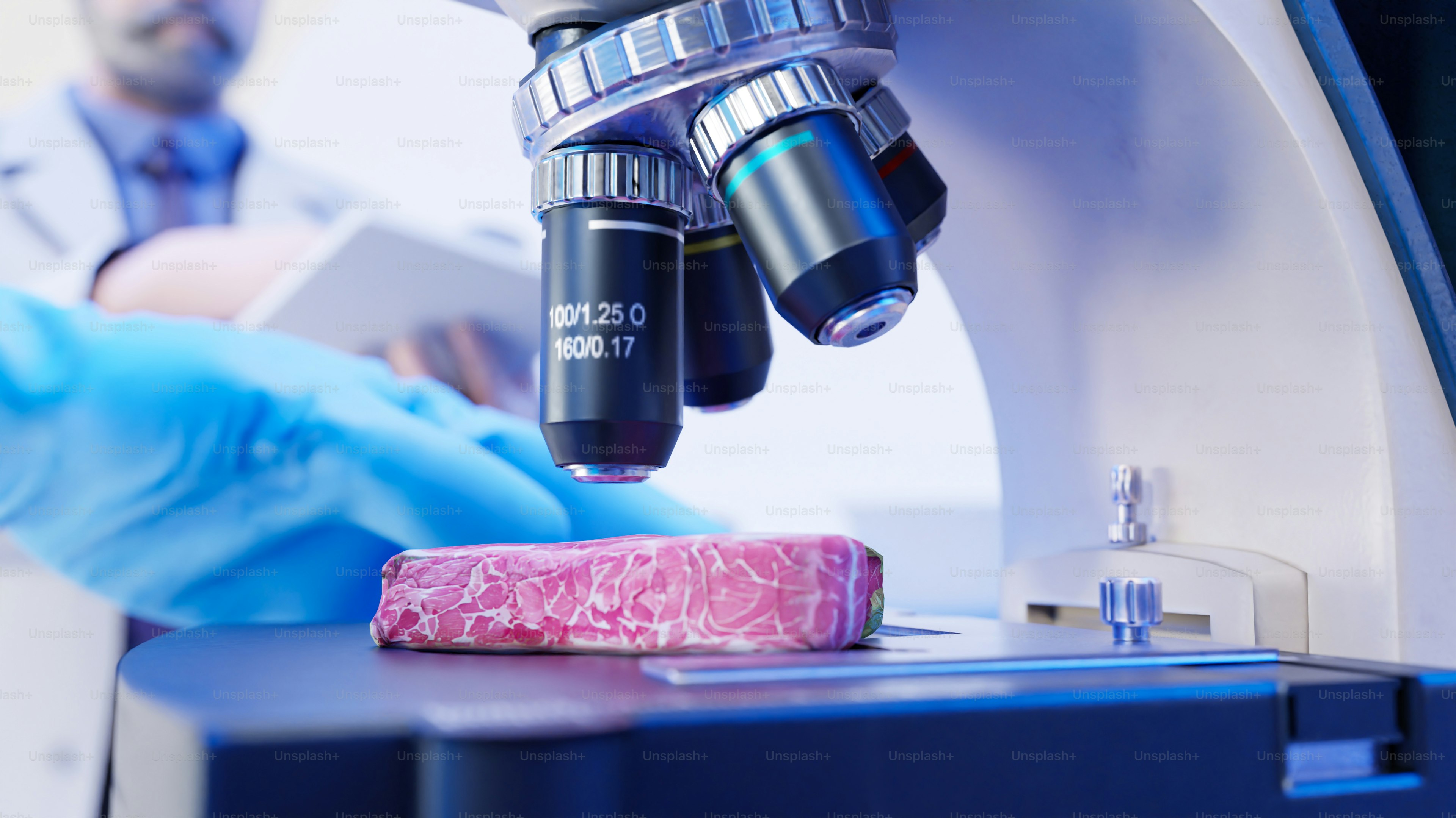 A gloved hand holding a piece of meat under a microscope photo – 3d ...