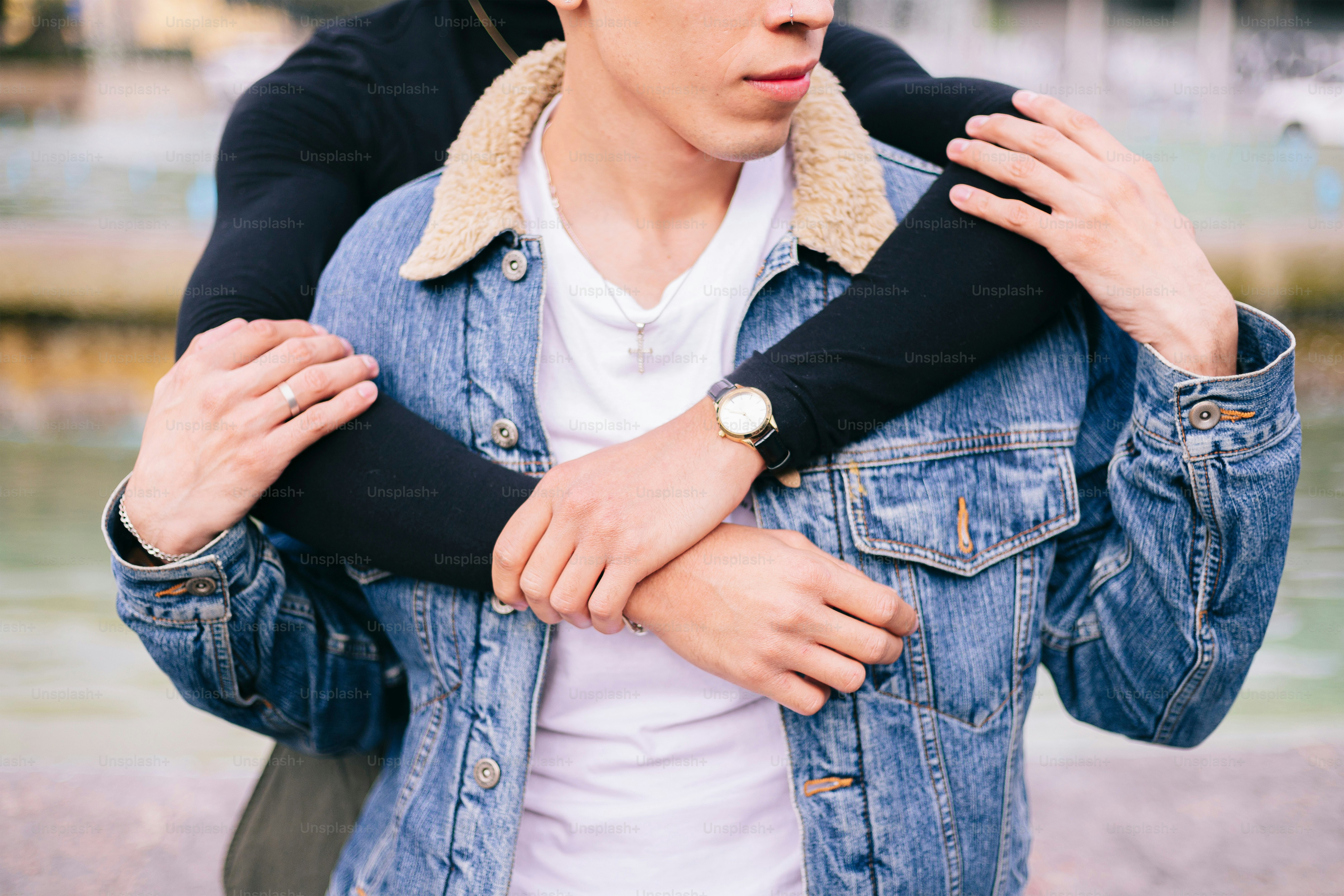A man carrying a woman on his back