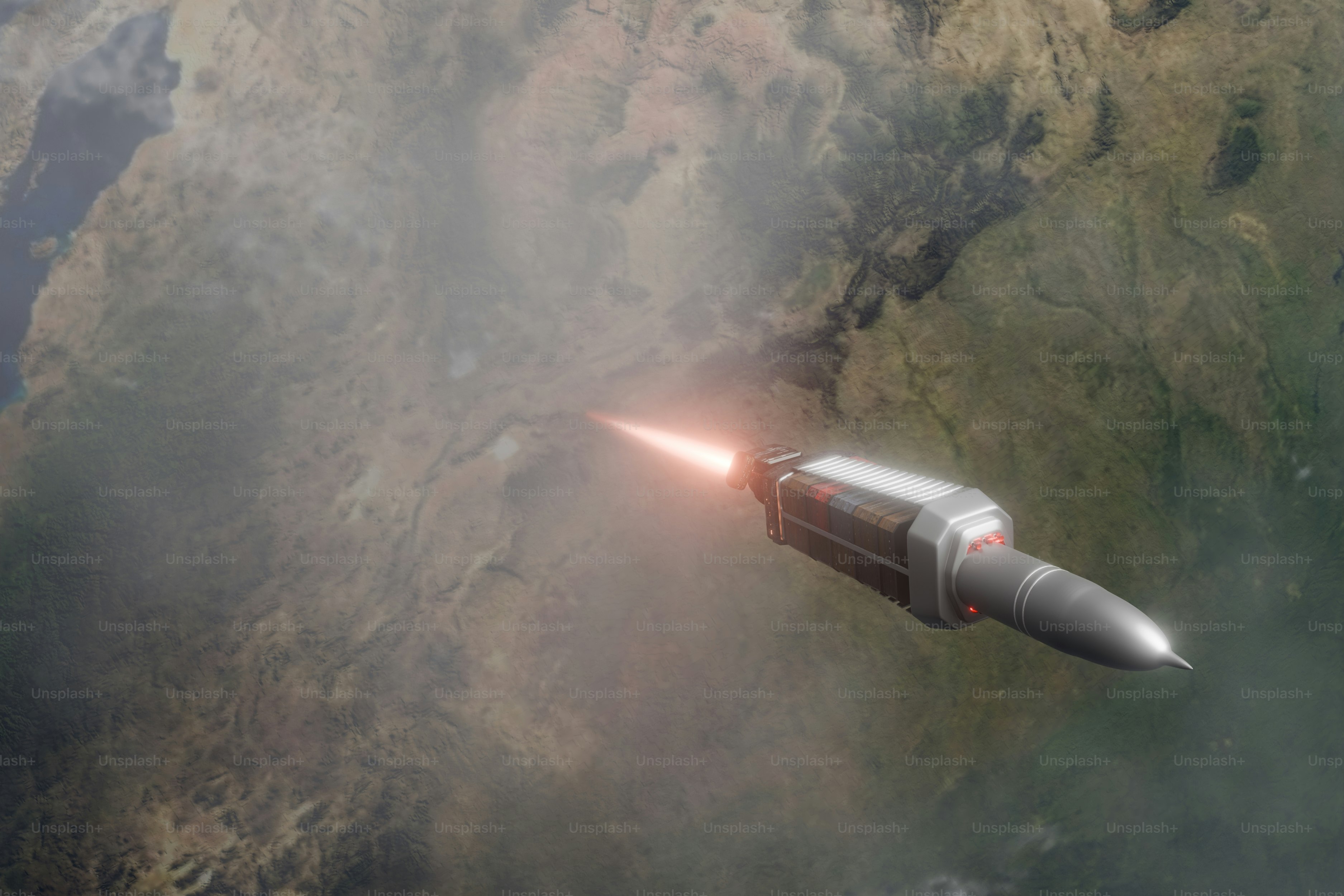 A jet flying through the air with a red light coming out of it