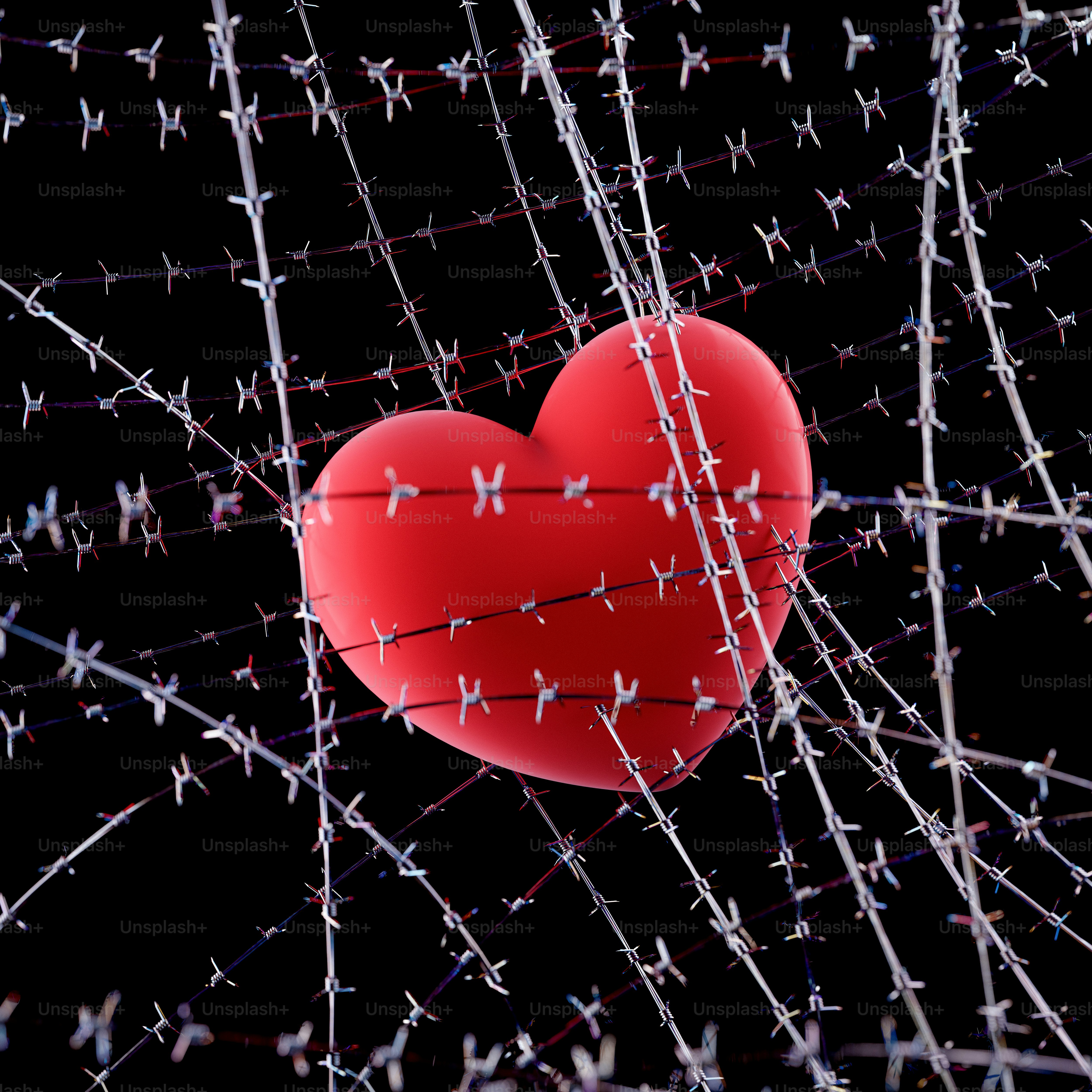 A red heart surrounded by barbed wire