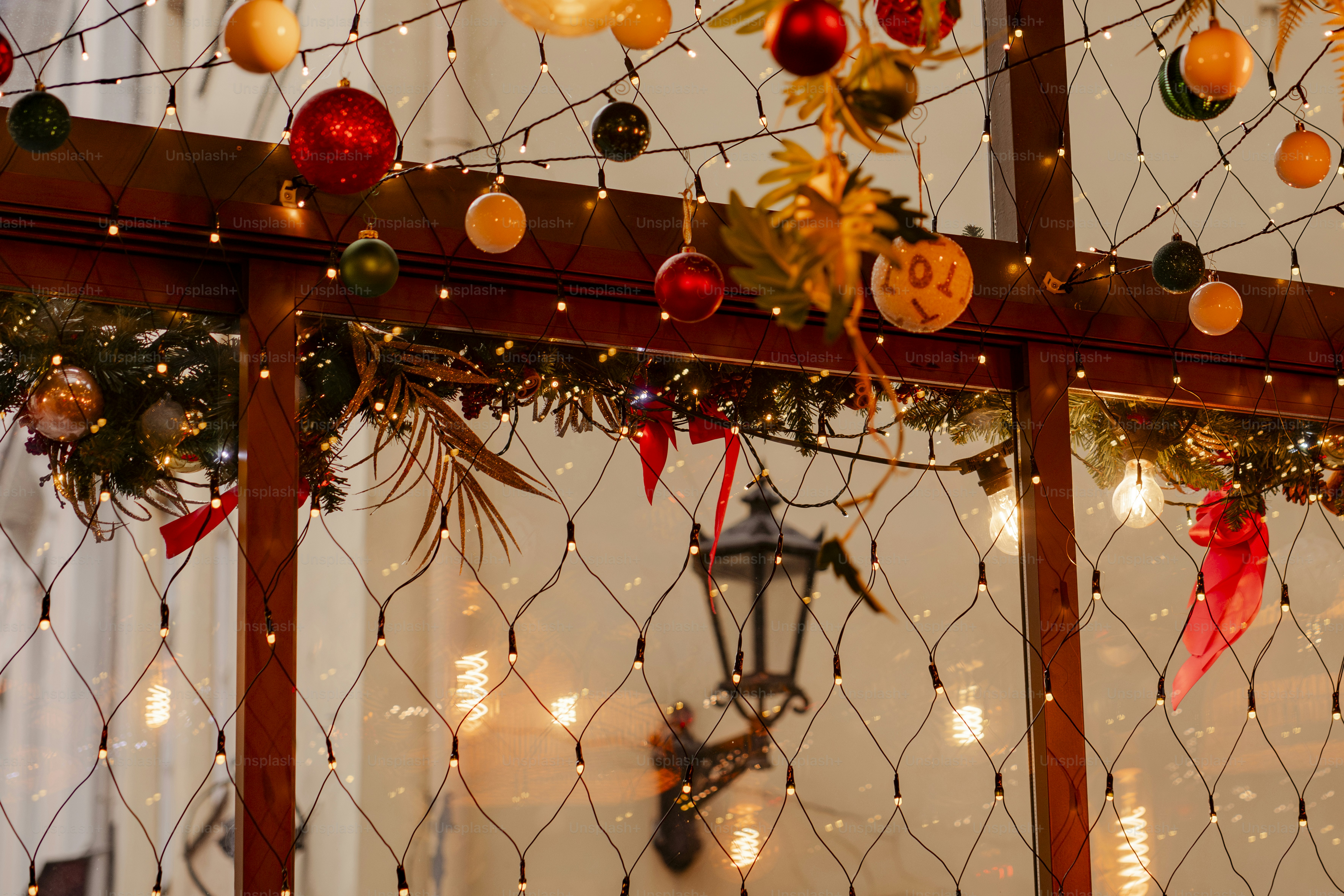 A table topped with lots of christmas decorations - Photo on Unsplash+
