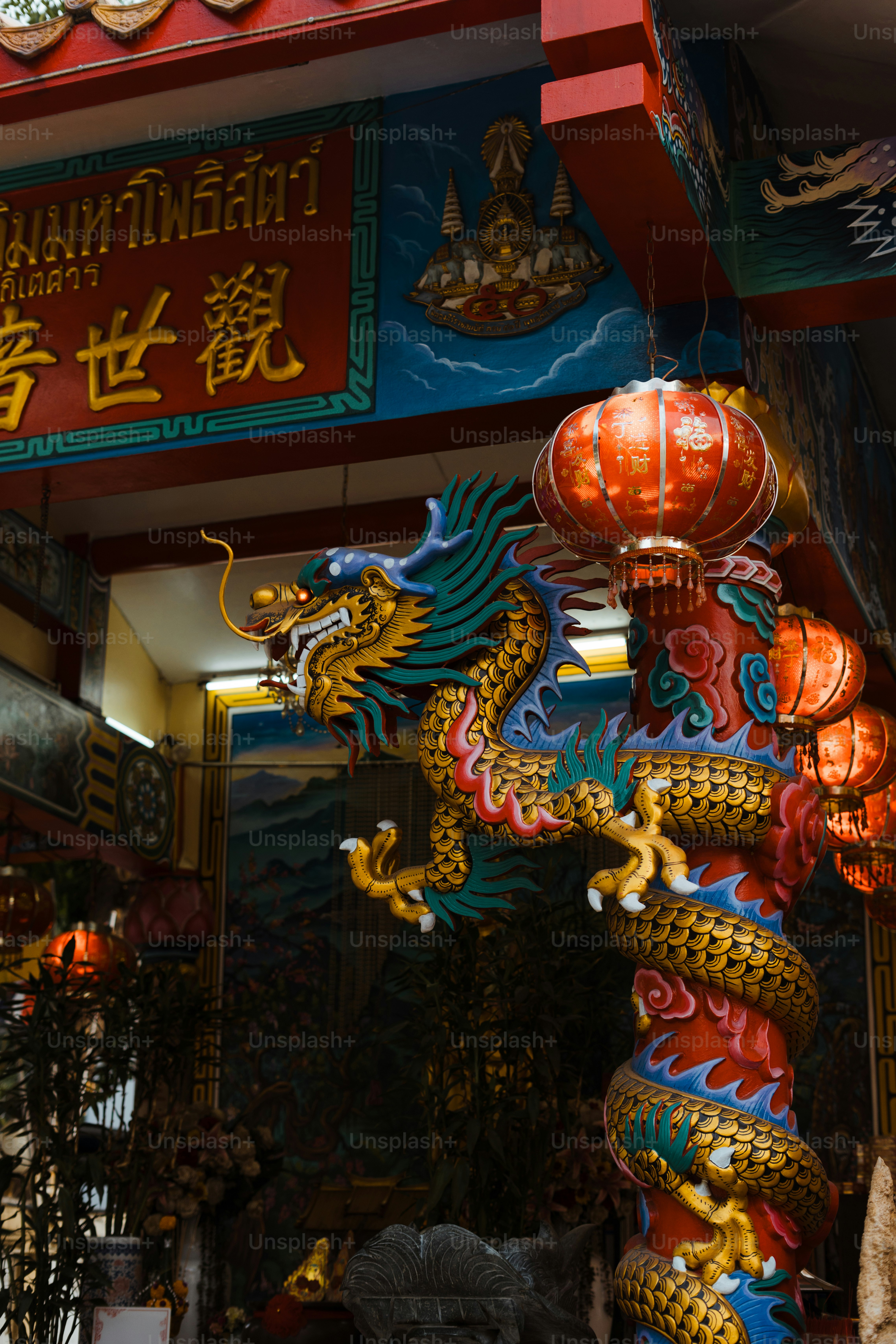 A dragon statue in front of a chinese store