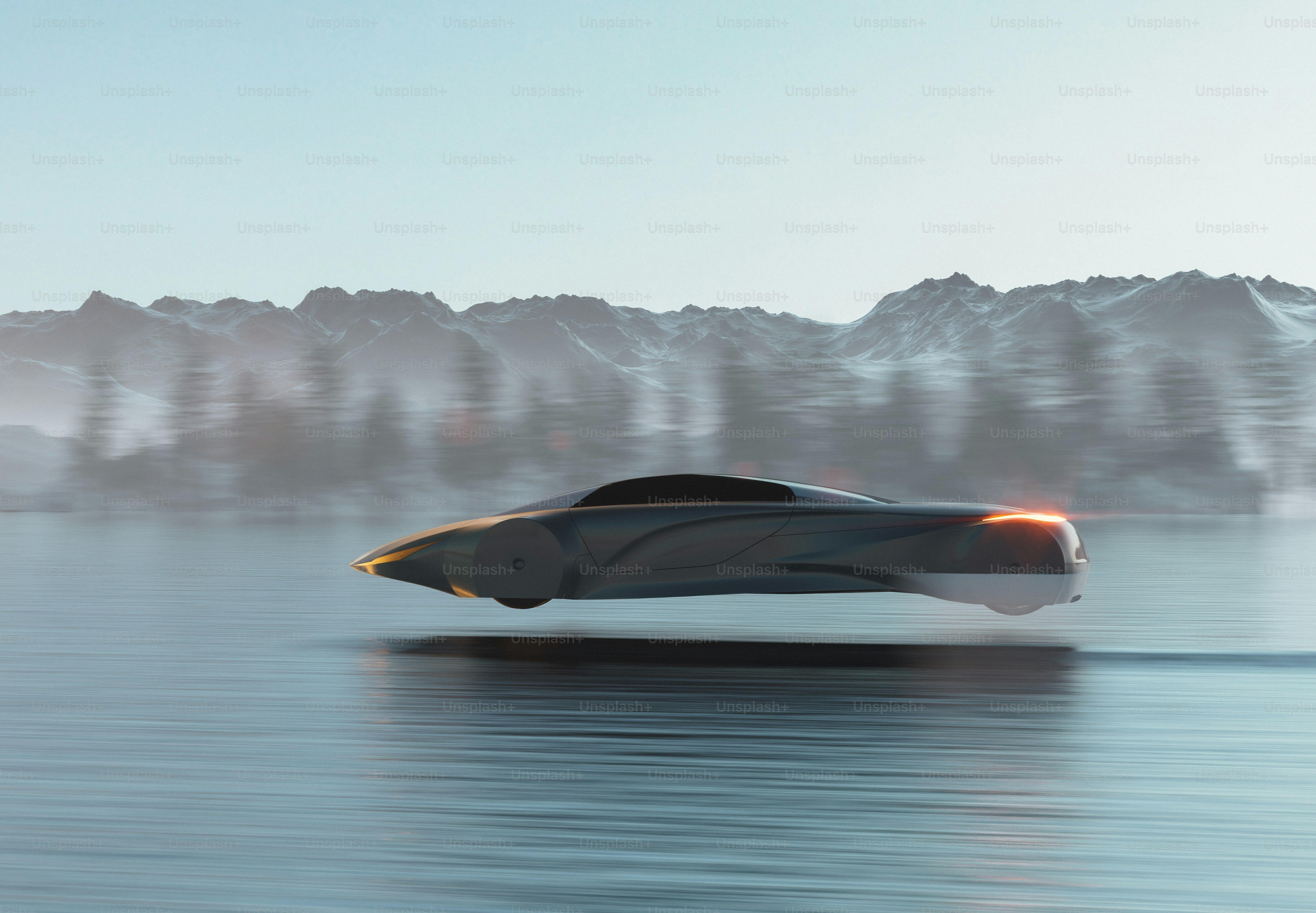 A speed boat in the water with mountains in the background