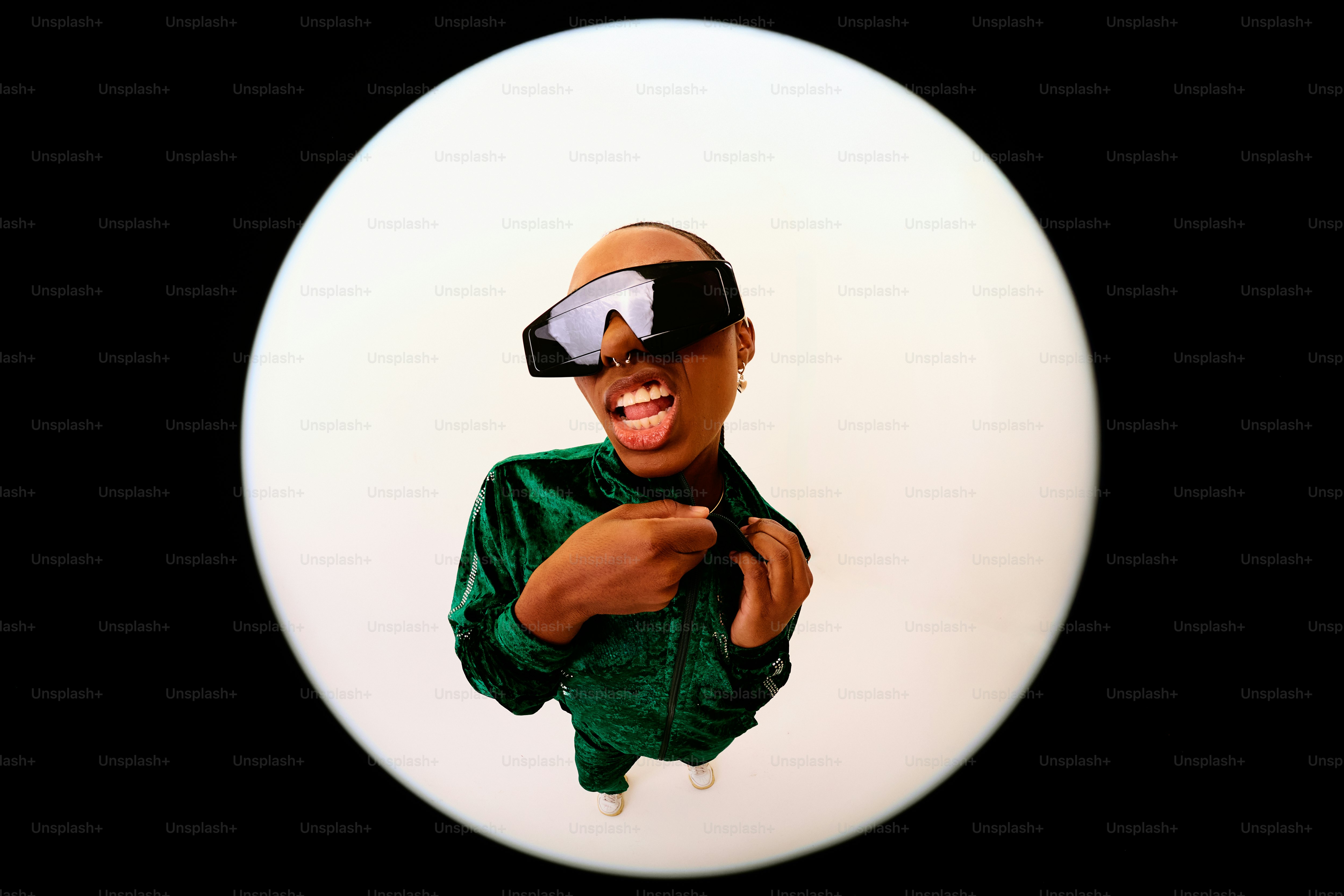 A picture of a man wearing a green shirt