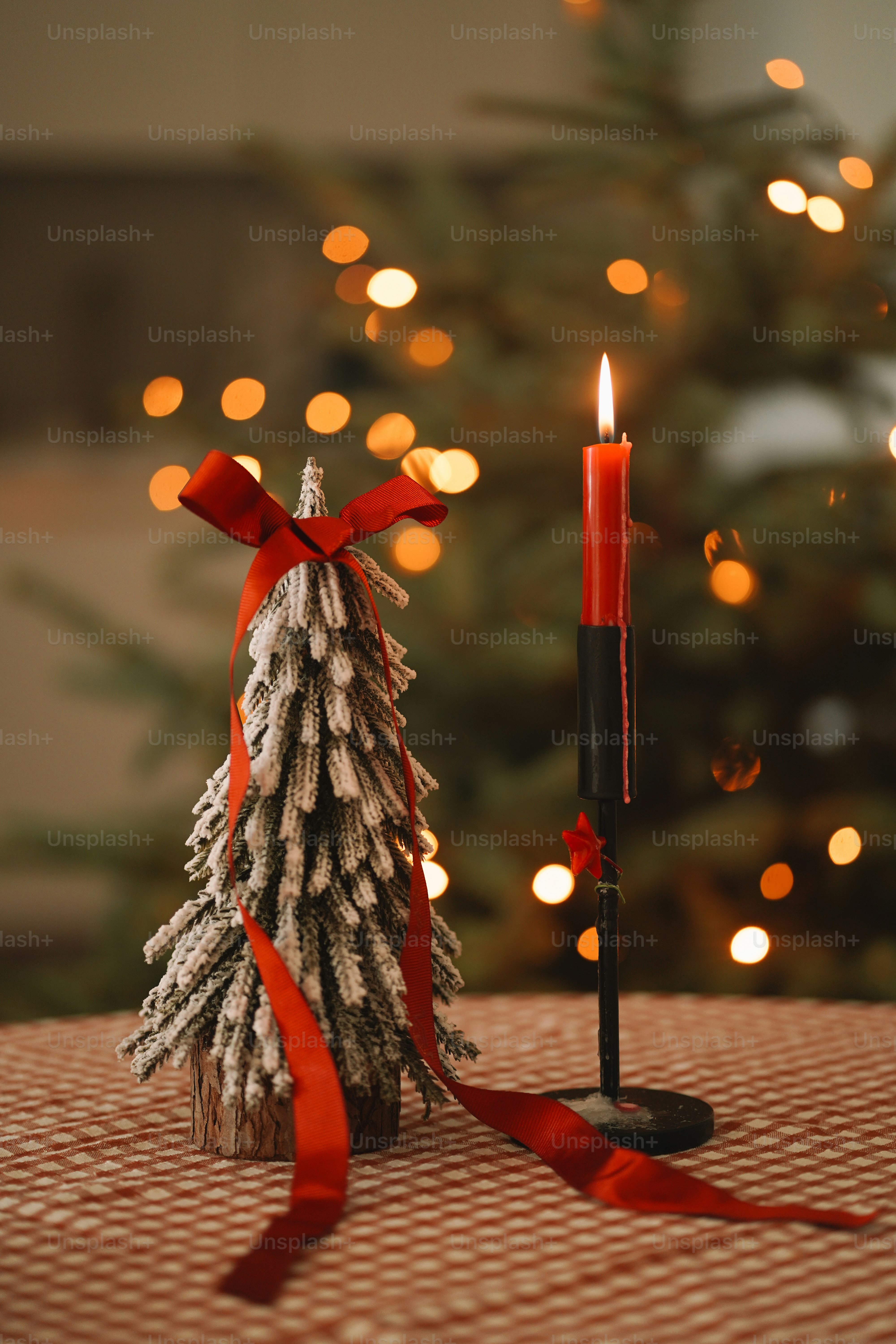 A small christmas tree sitting on top of a table