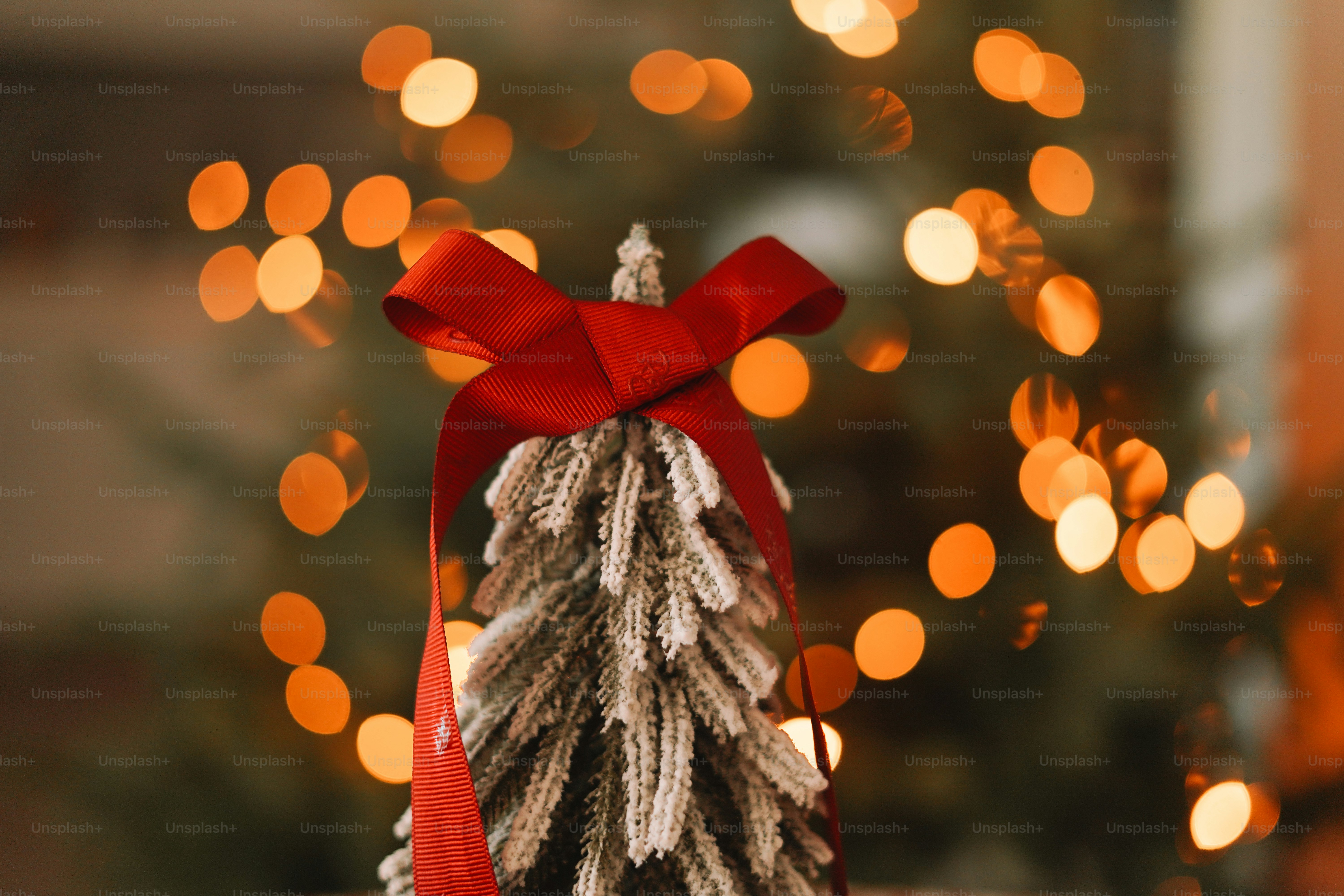 A small christmas tree sitting on top of a table