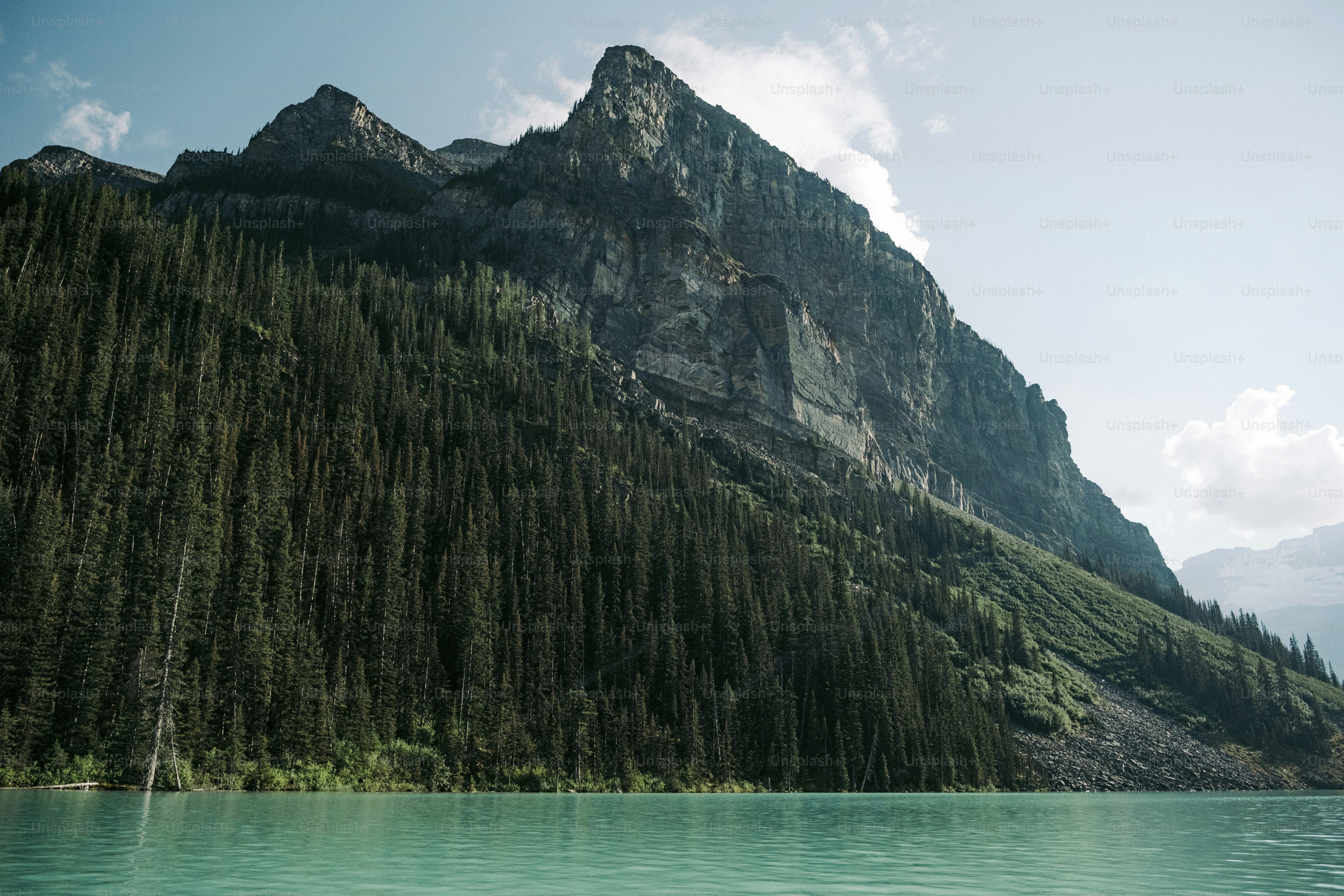 A lake with a mountain in the background