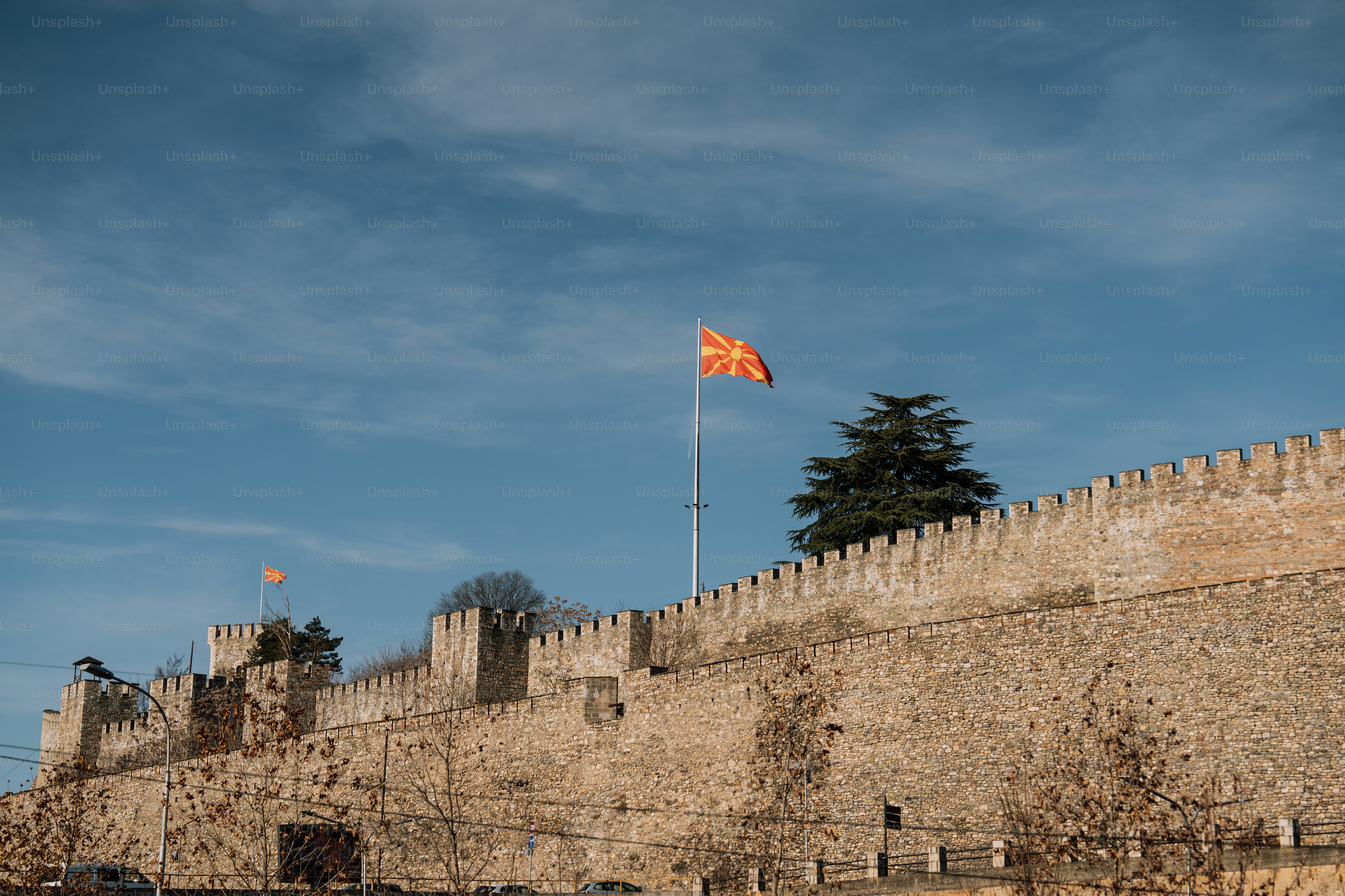 A castle with a flag on top of it