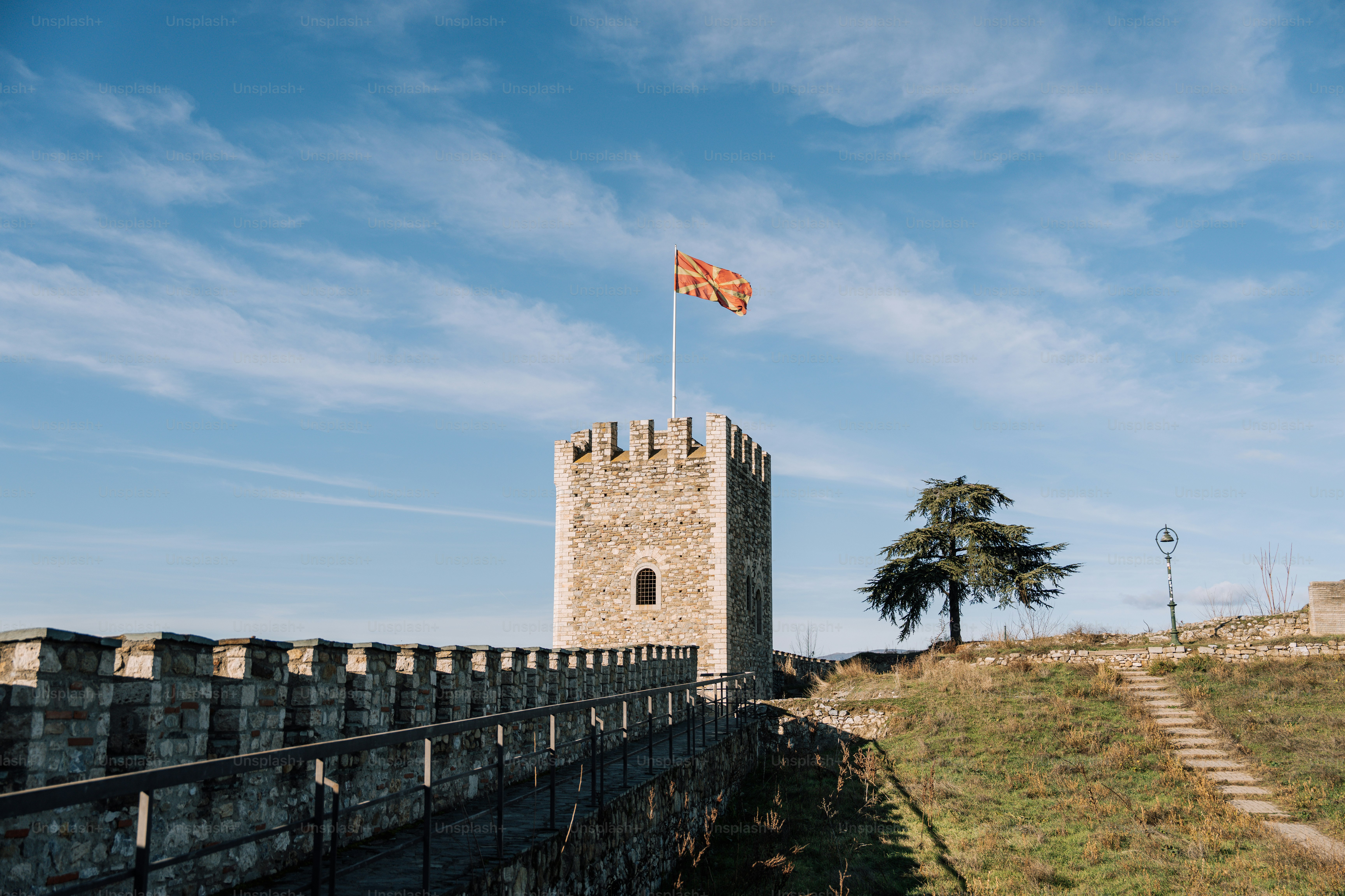 A castle with a flag on top of it