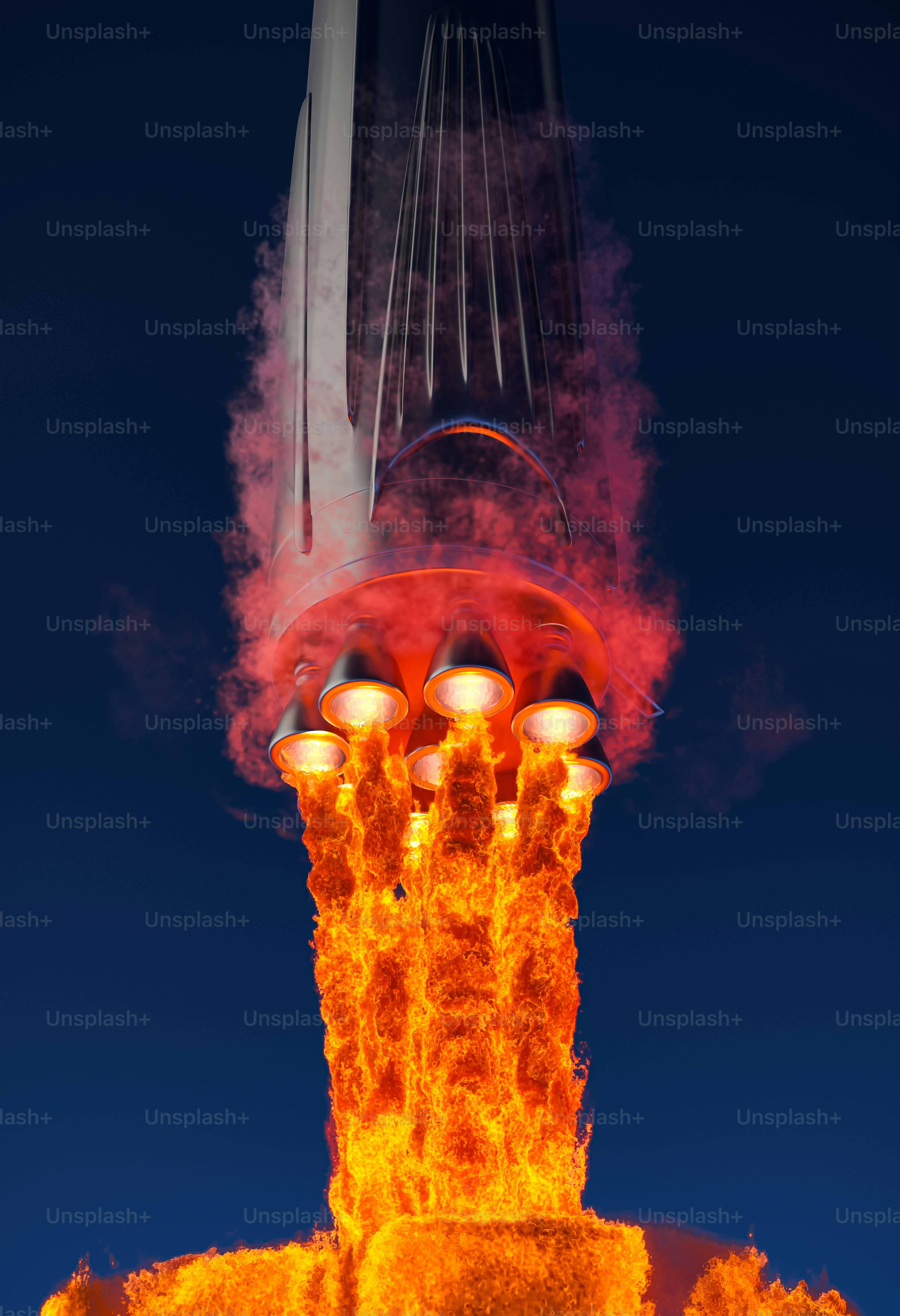 A very tall tower with a lot of smoke coming out of it