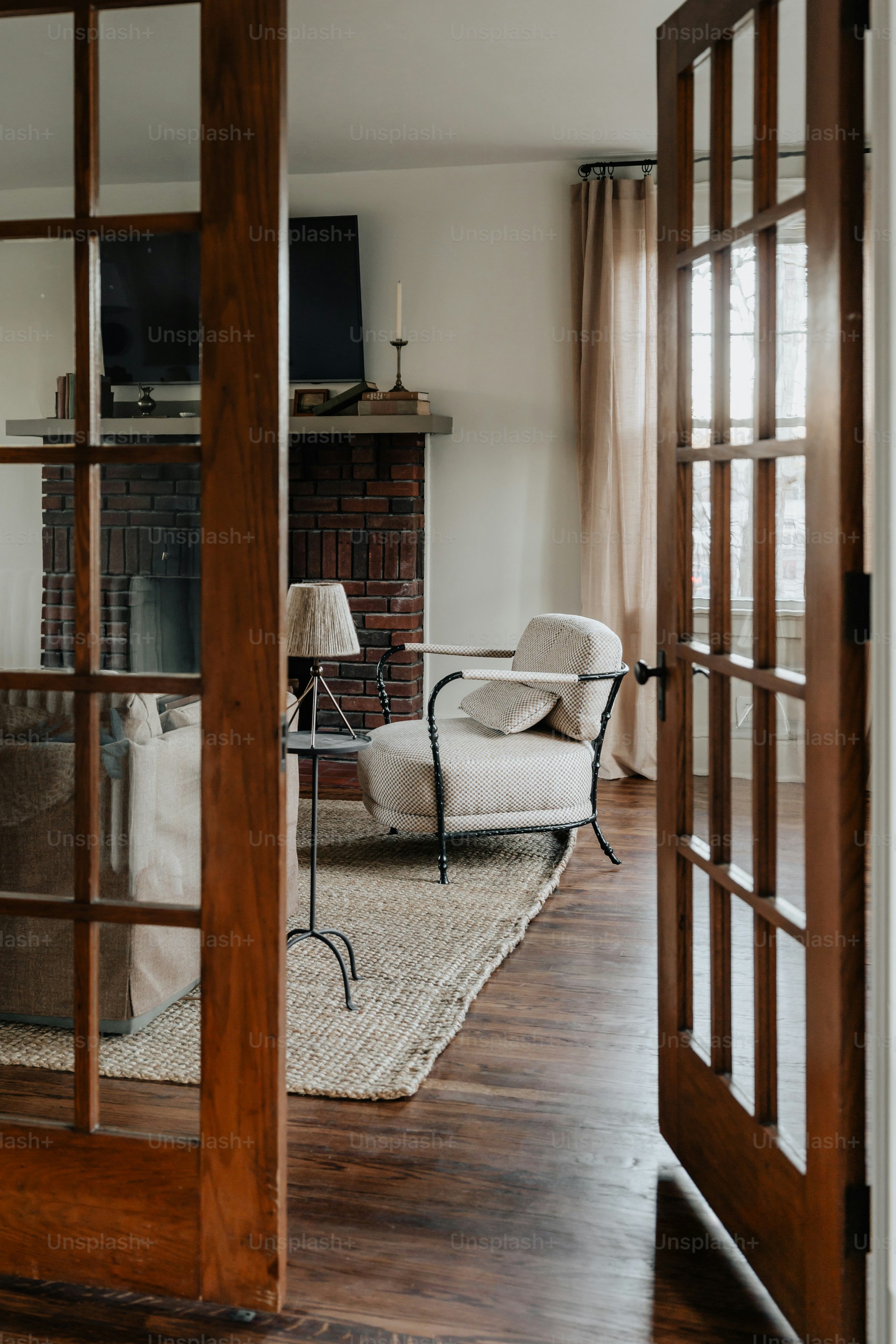 A living room filled with furniture and a fire place