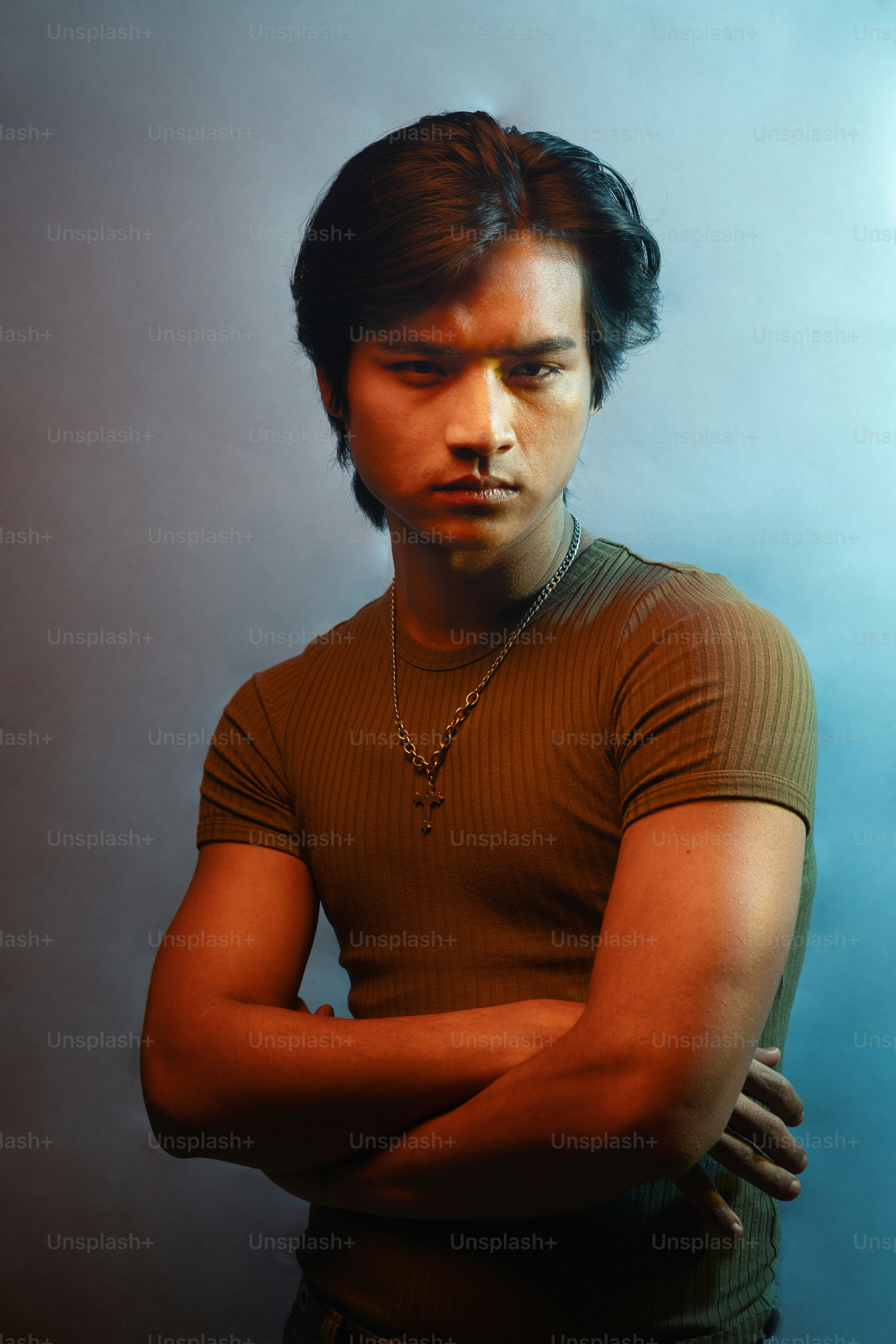 A man standing with his arms crossed