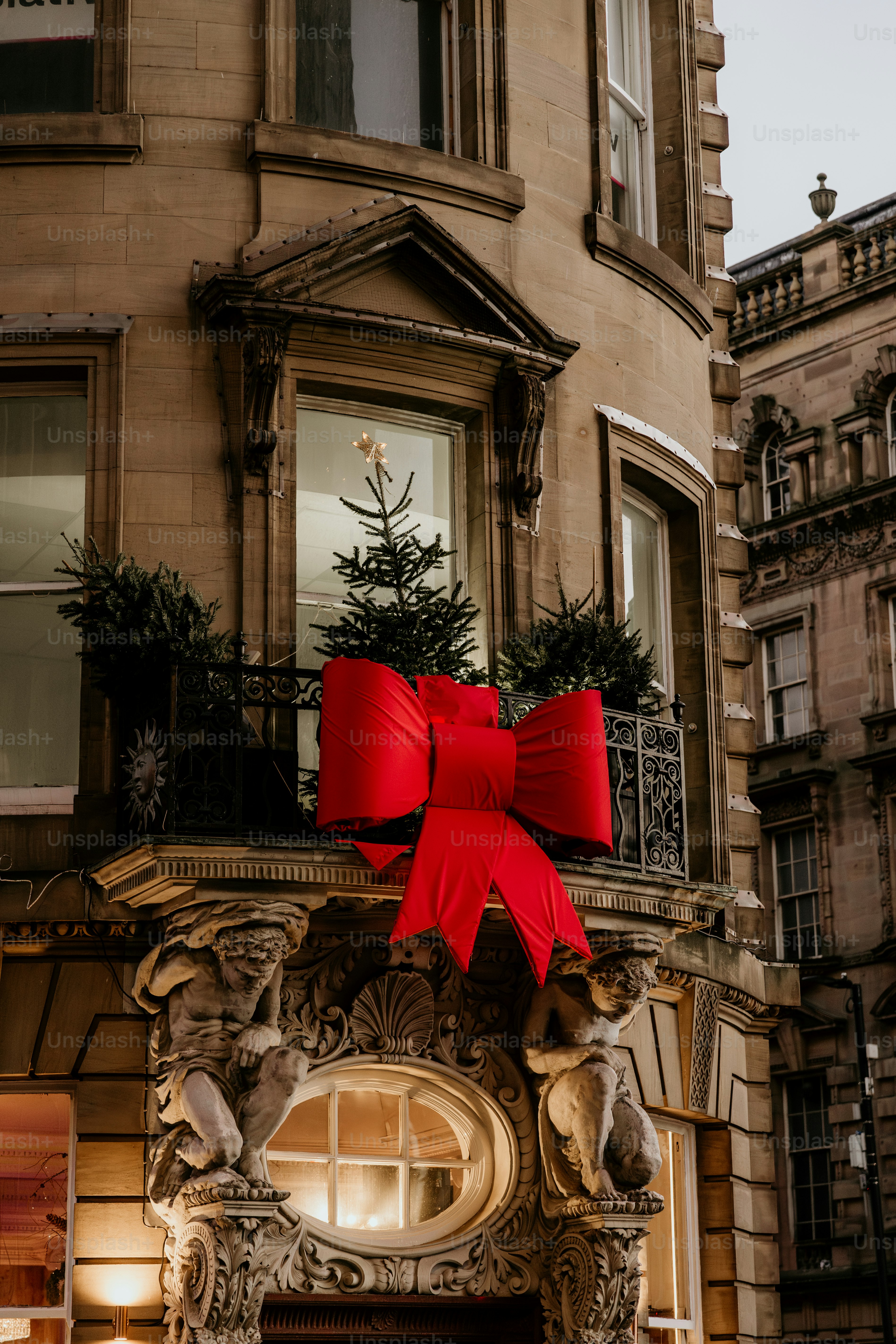 A building with a red bow on top of it
