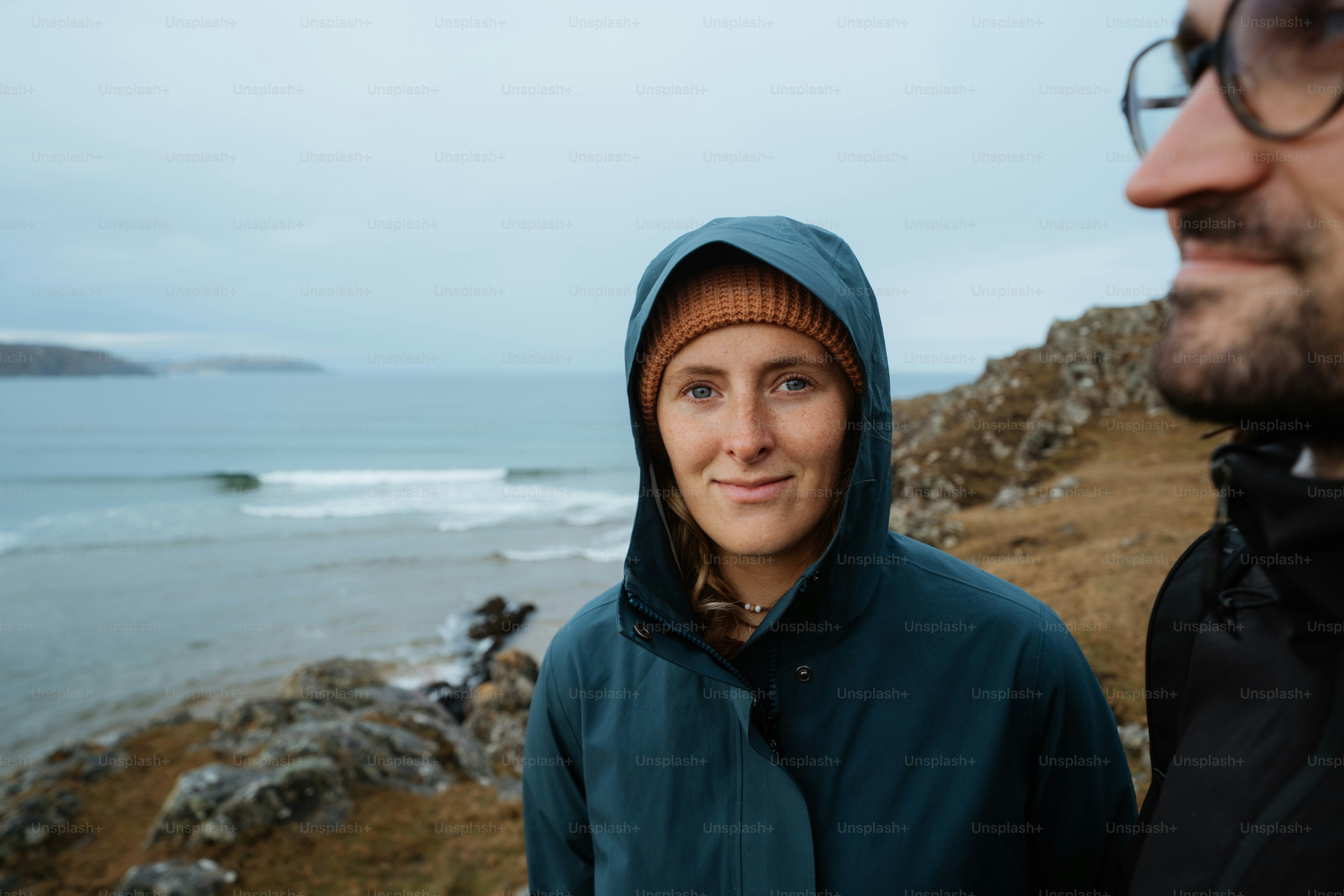 A man and a woman standing next to each other