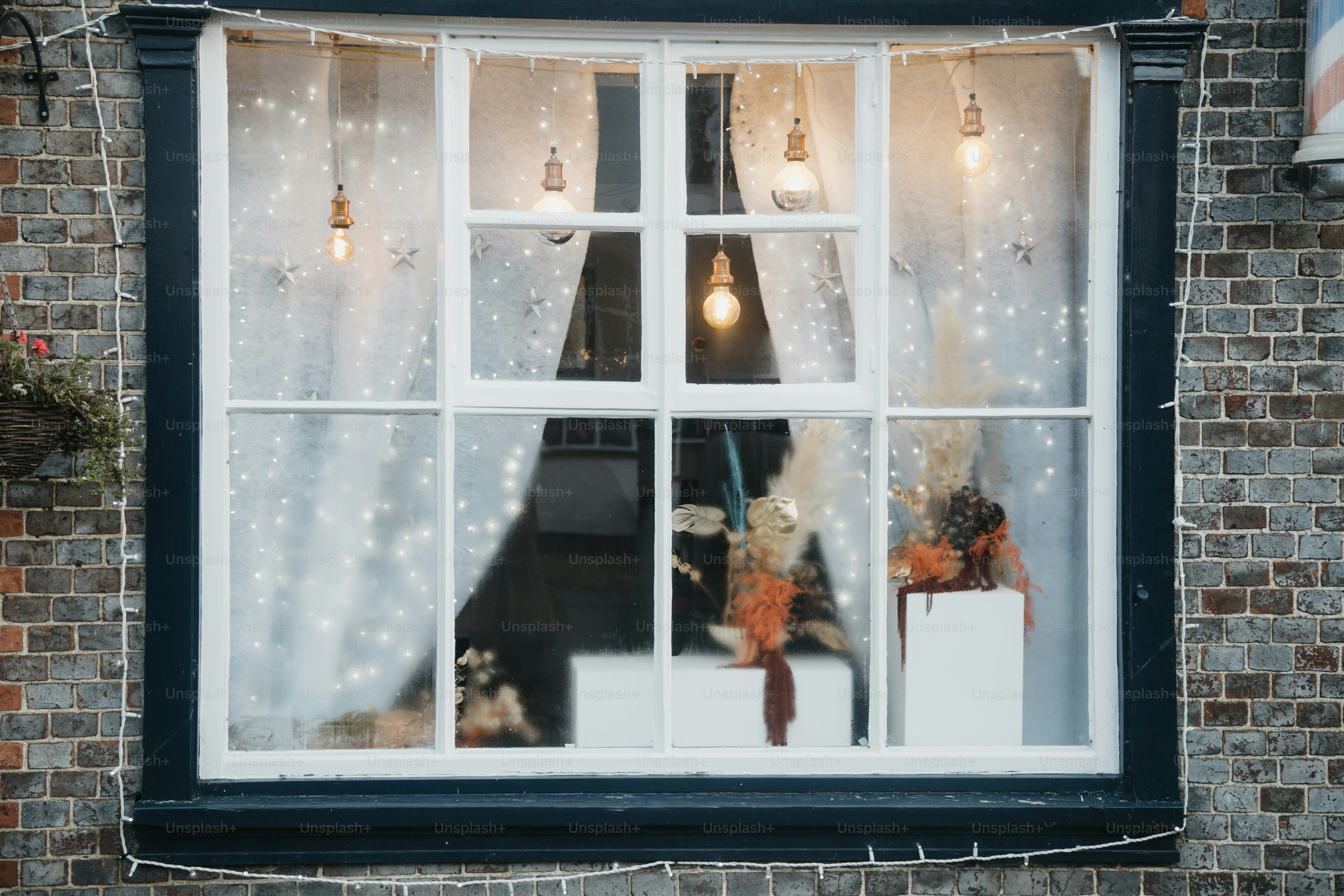 A window that has a bunch of lights in it