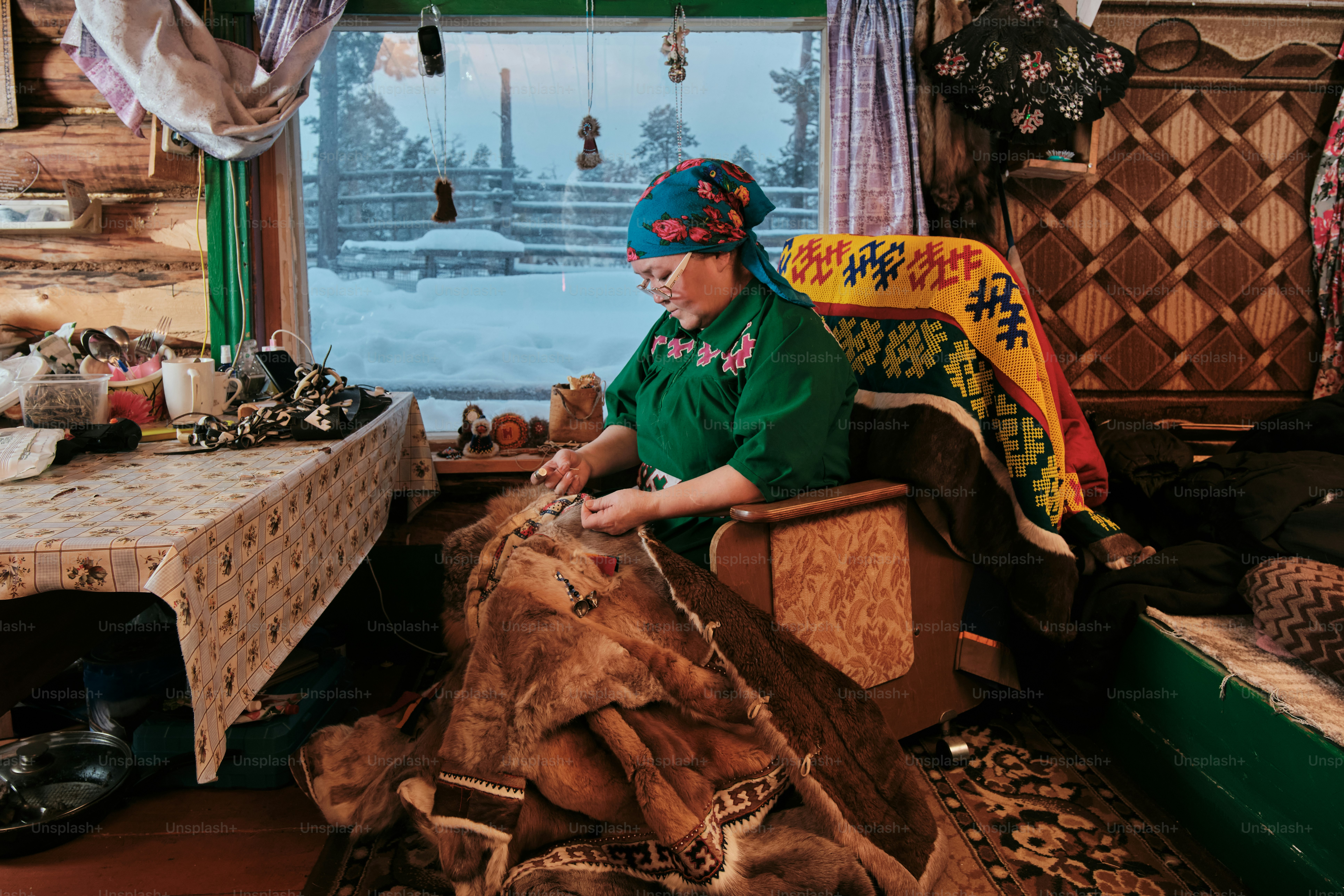 A woman sitting in a chair in a room