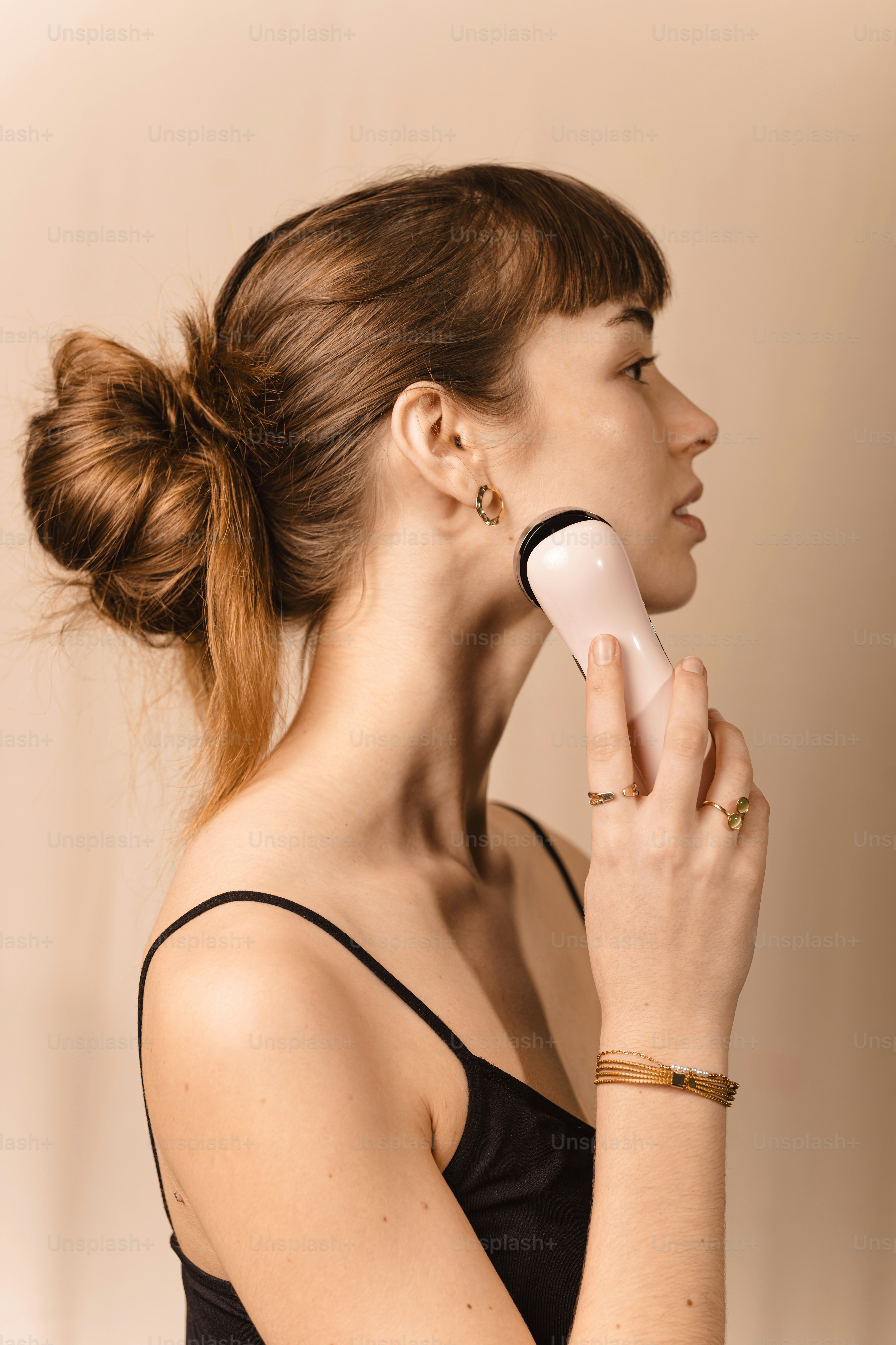 A woman with a hair dryer in her hand