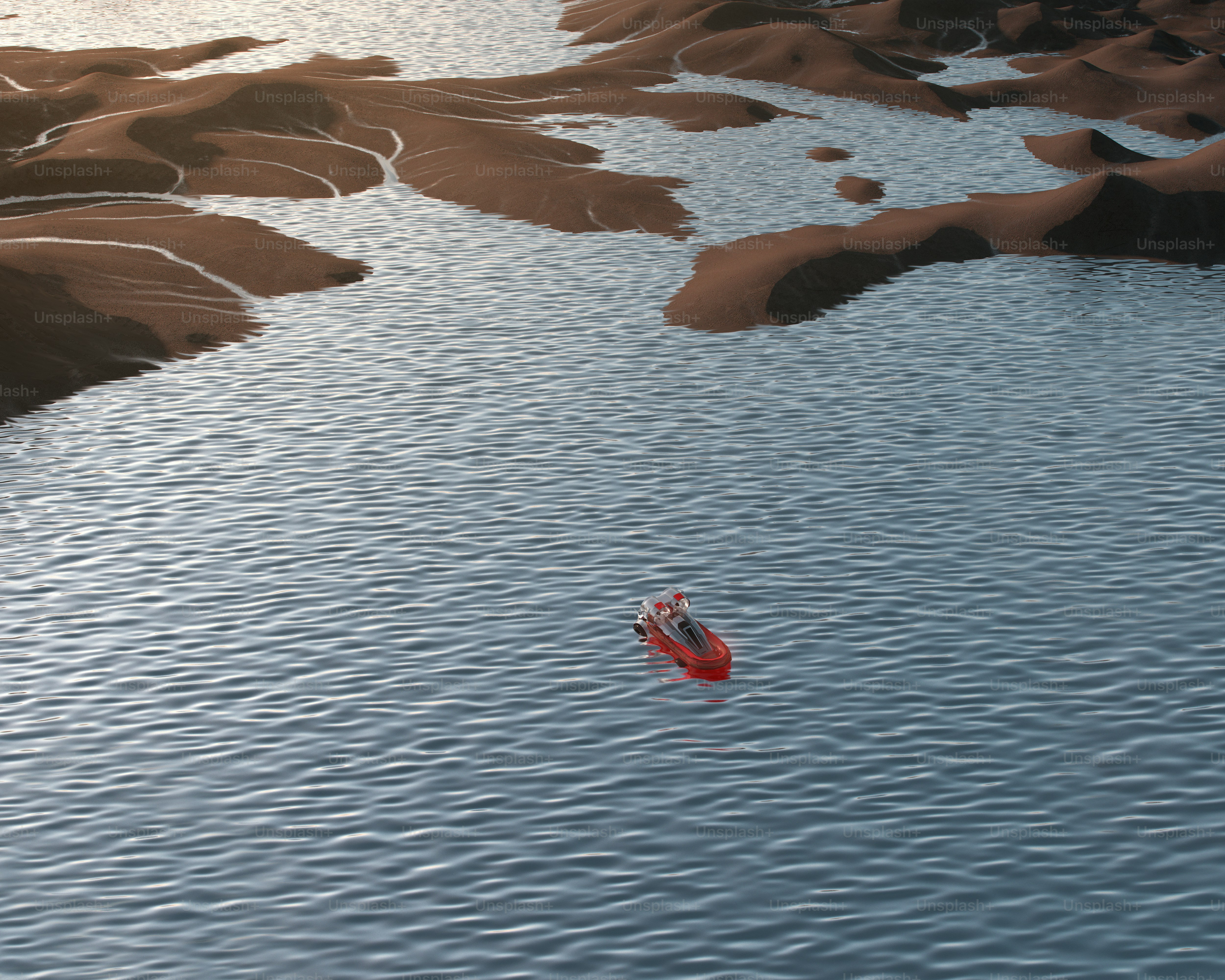 A boat floating on top of a lake surrounded by mountains