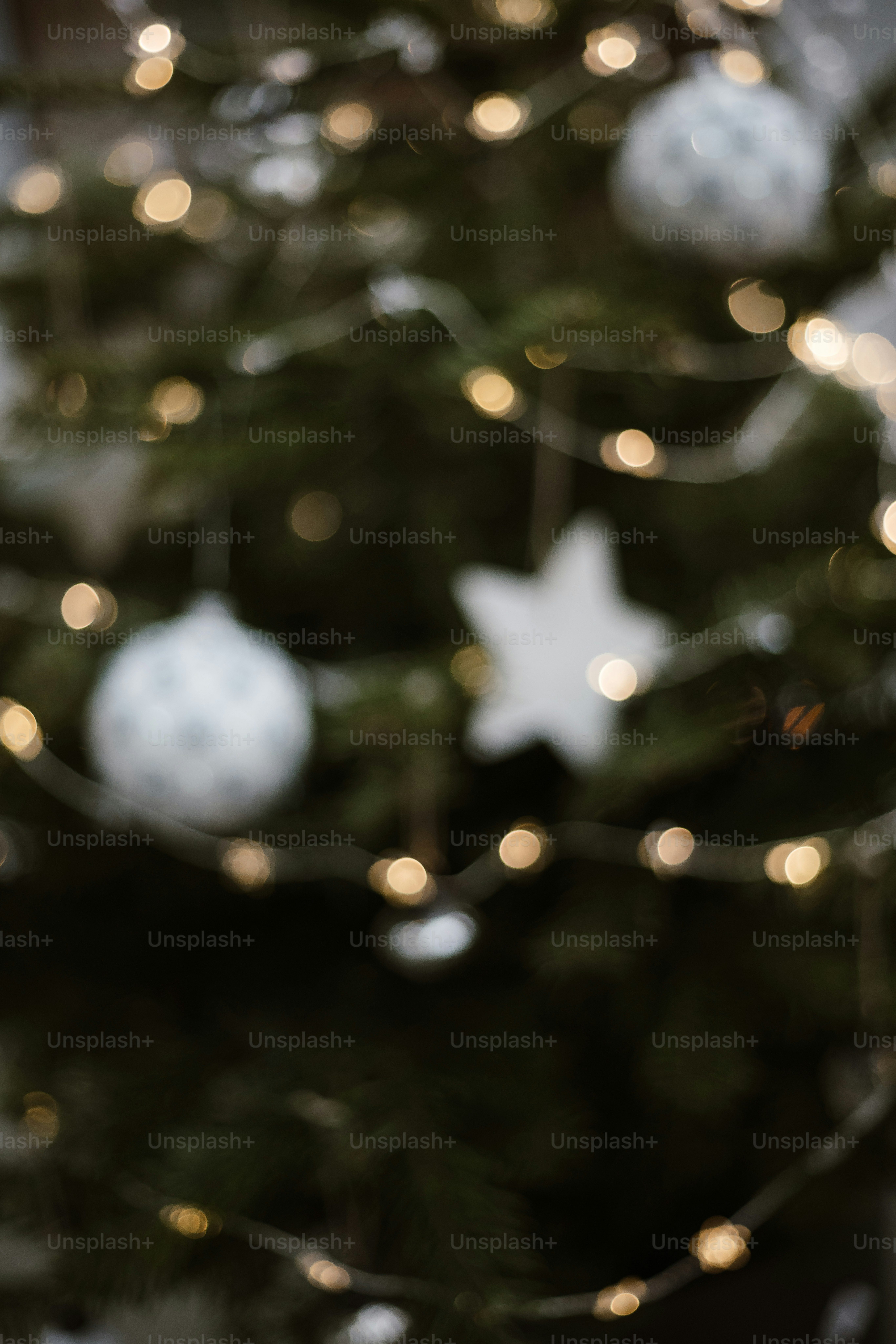 A close up of a christmas tree with lights