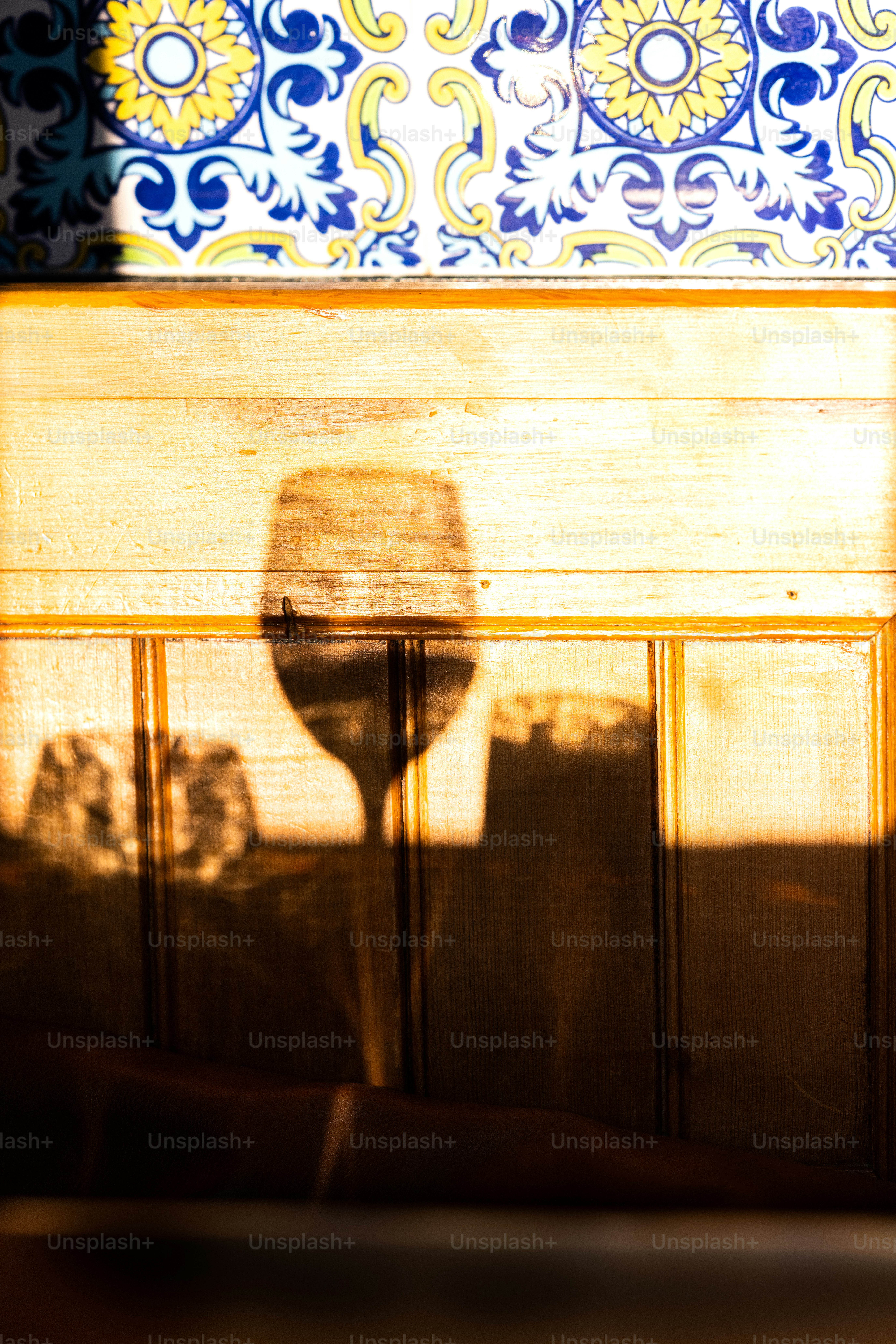 A shadow of a person on a wall