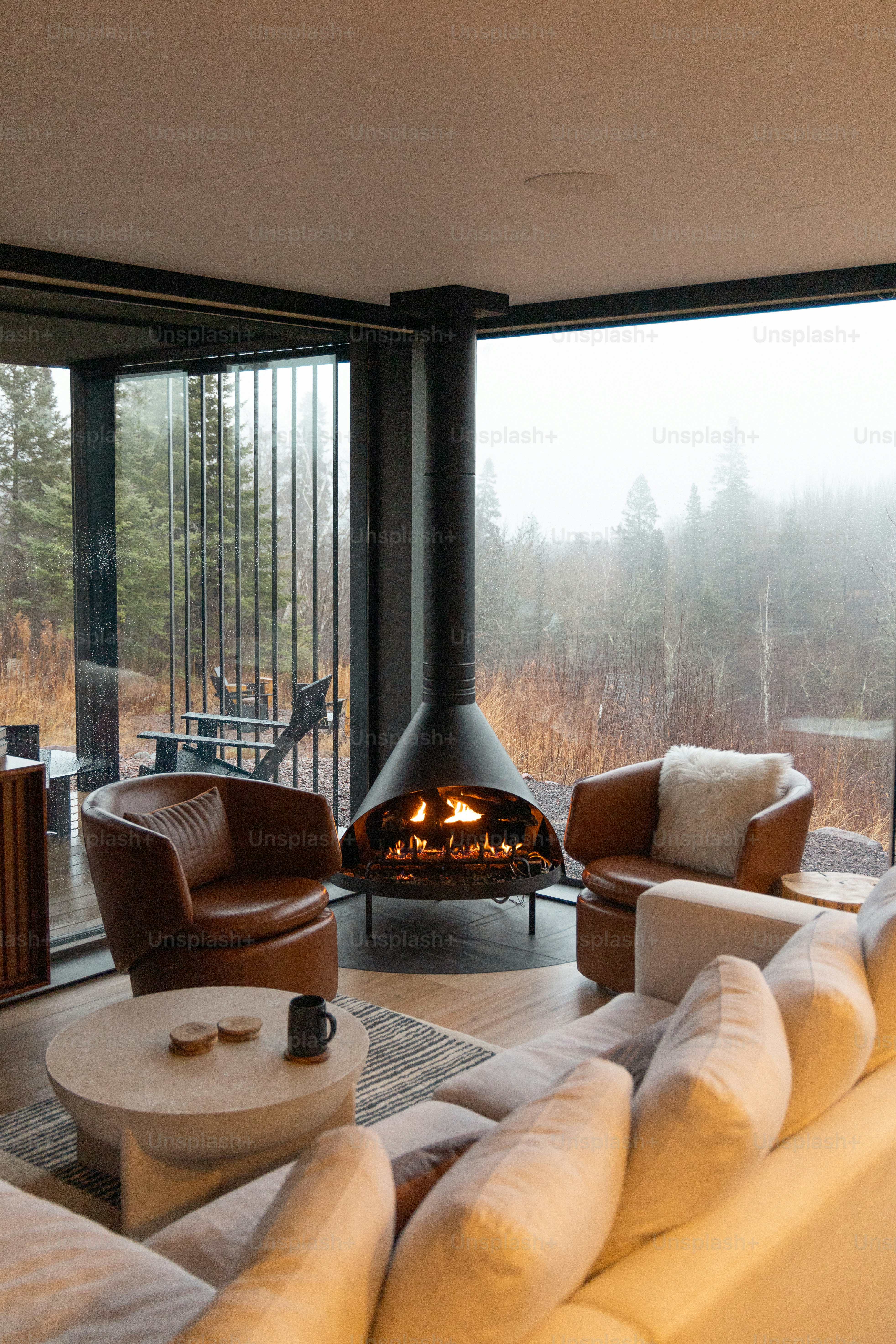A living room filled with furniture and a fire place