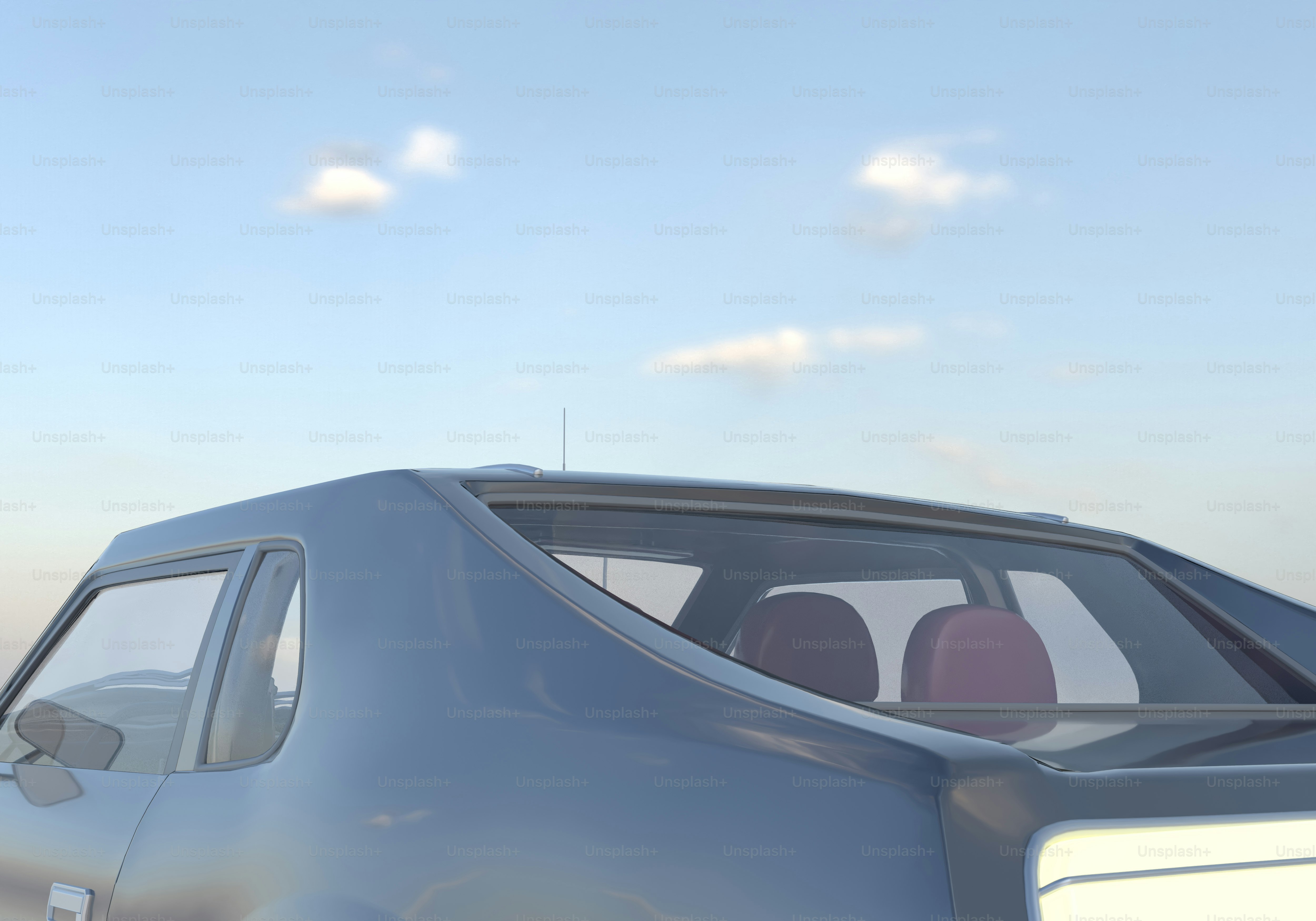 A car that is sitting in the grass