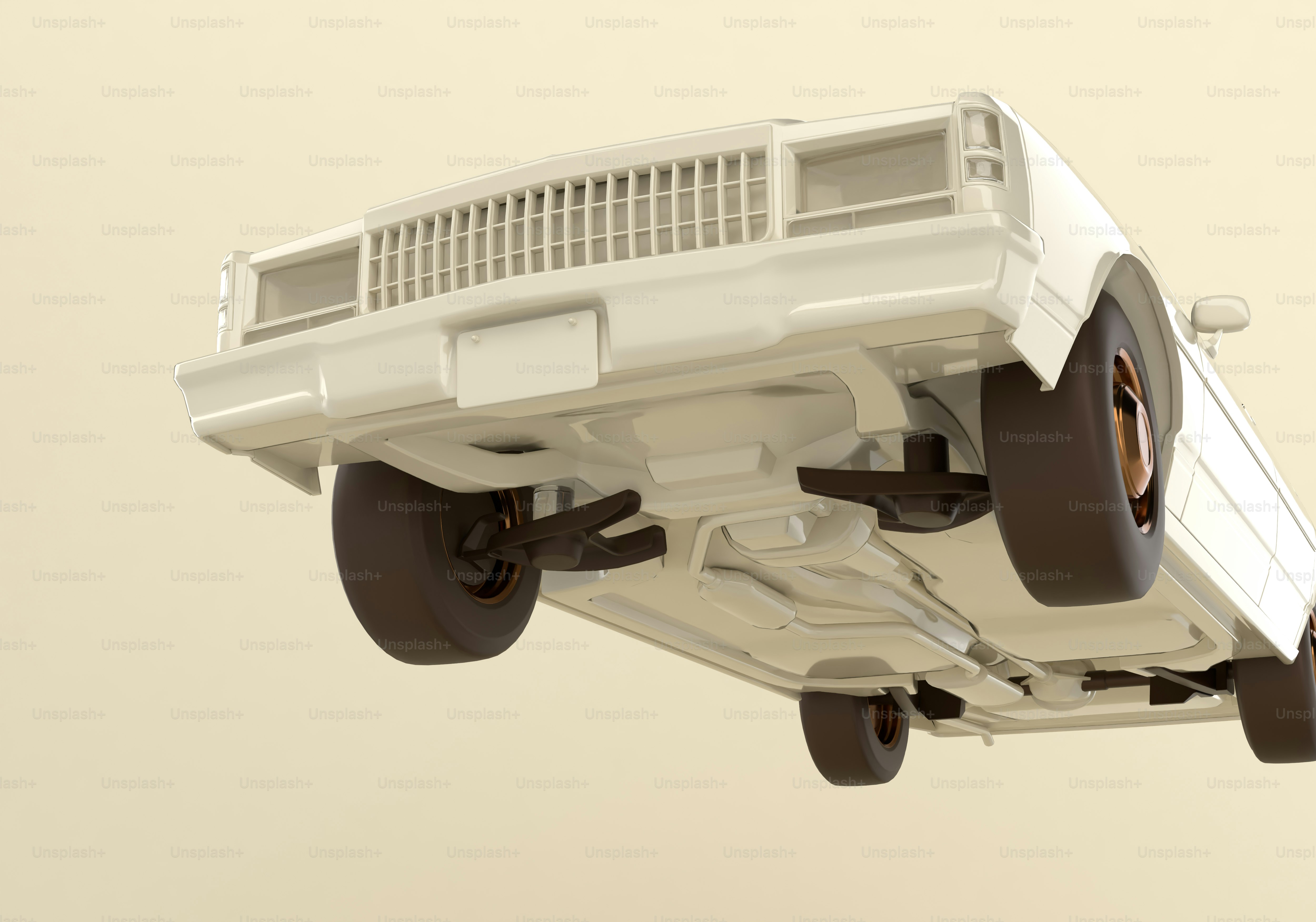 A white car is flying through the air