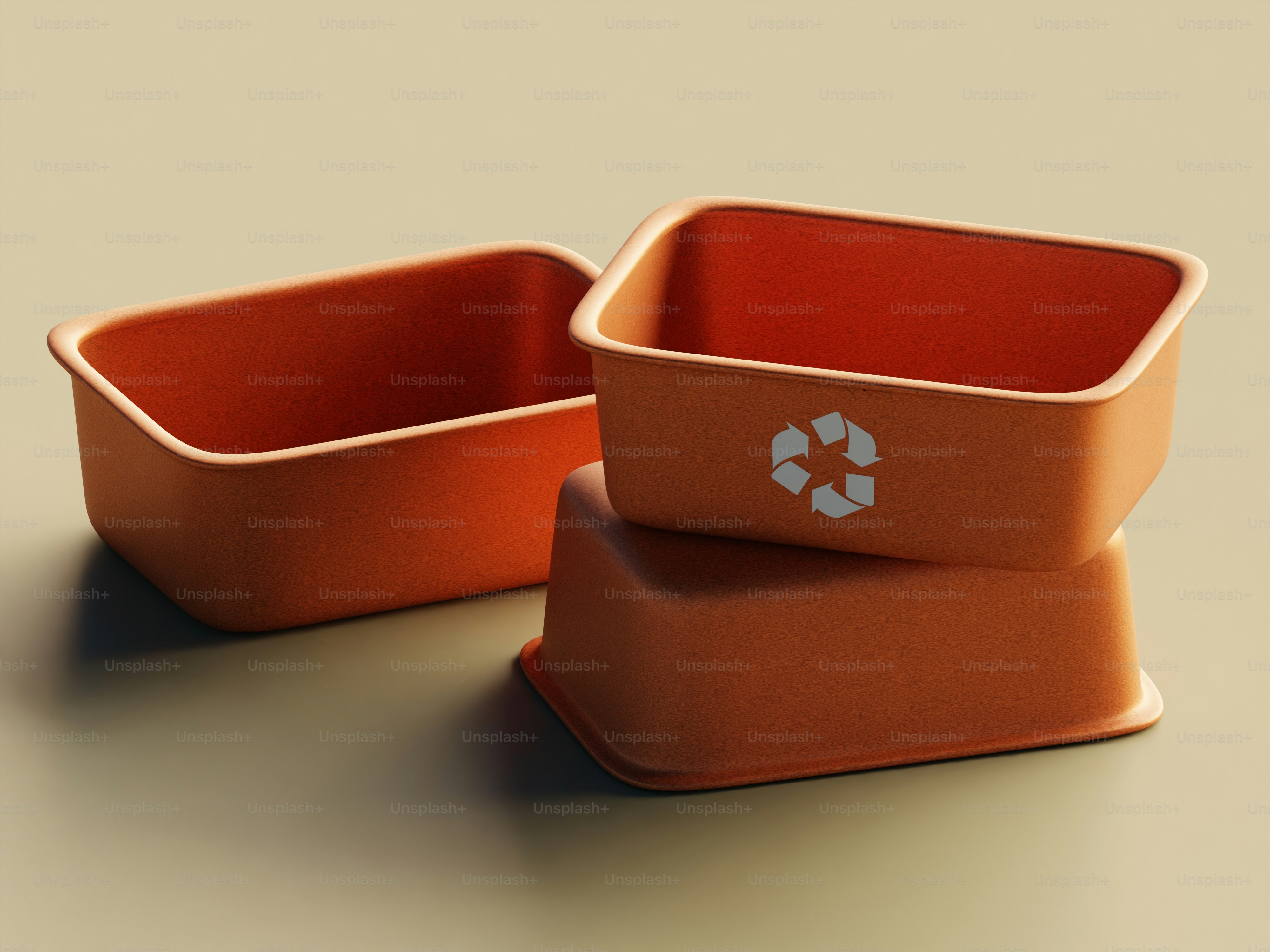A couple of orange containers sitting on top of a table
