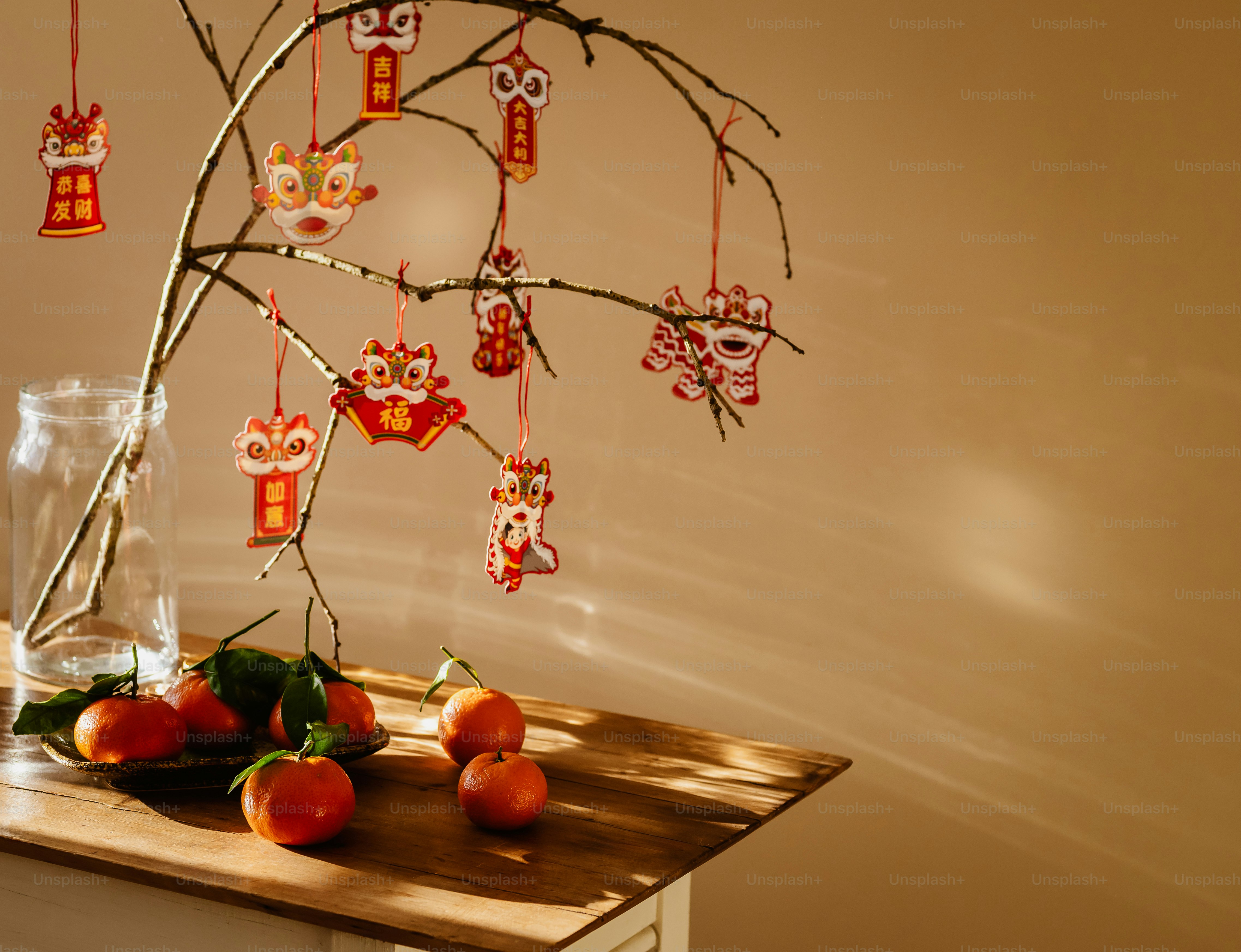 A tree with ornaments hanging from it's branches