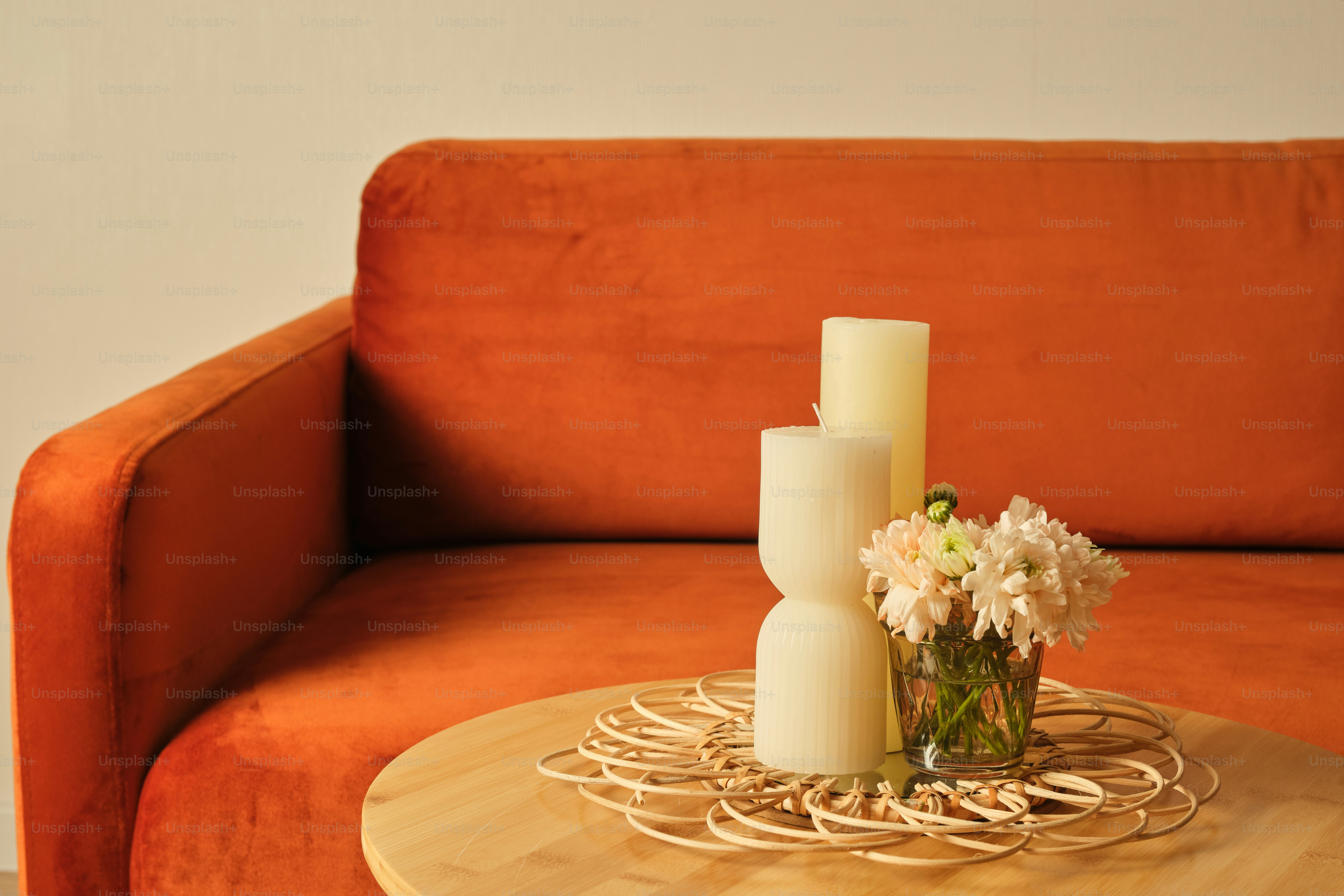 A table with a vase of flowers on top of it