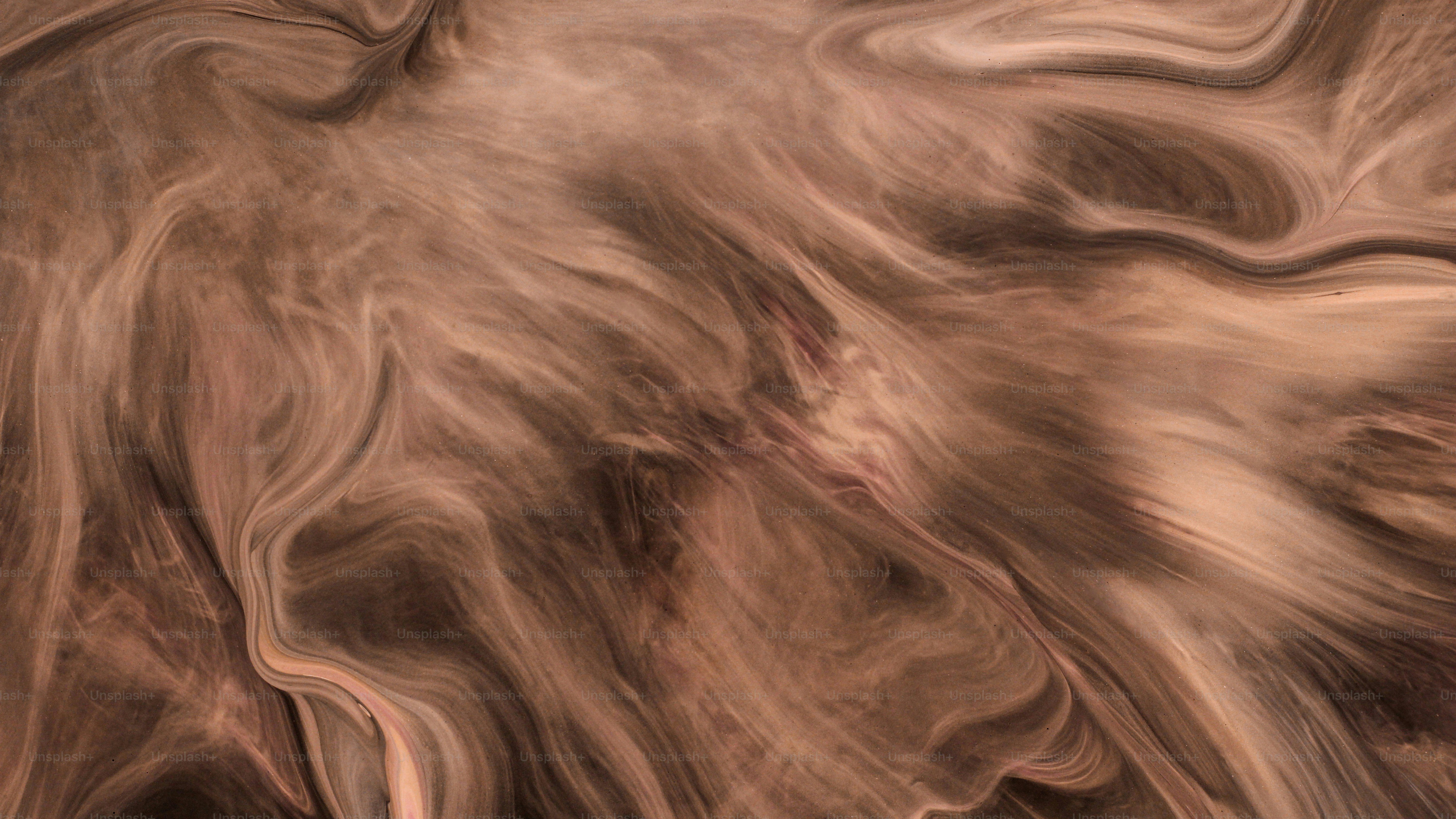 An abstract image of a brown and white swirl