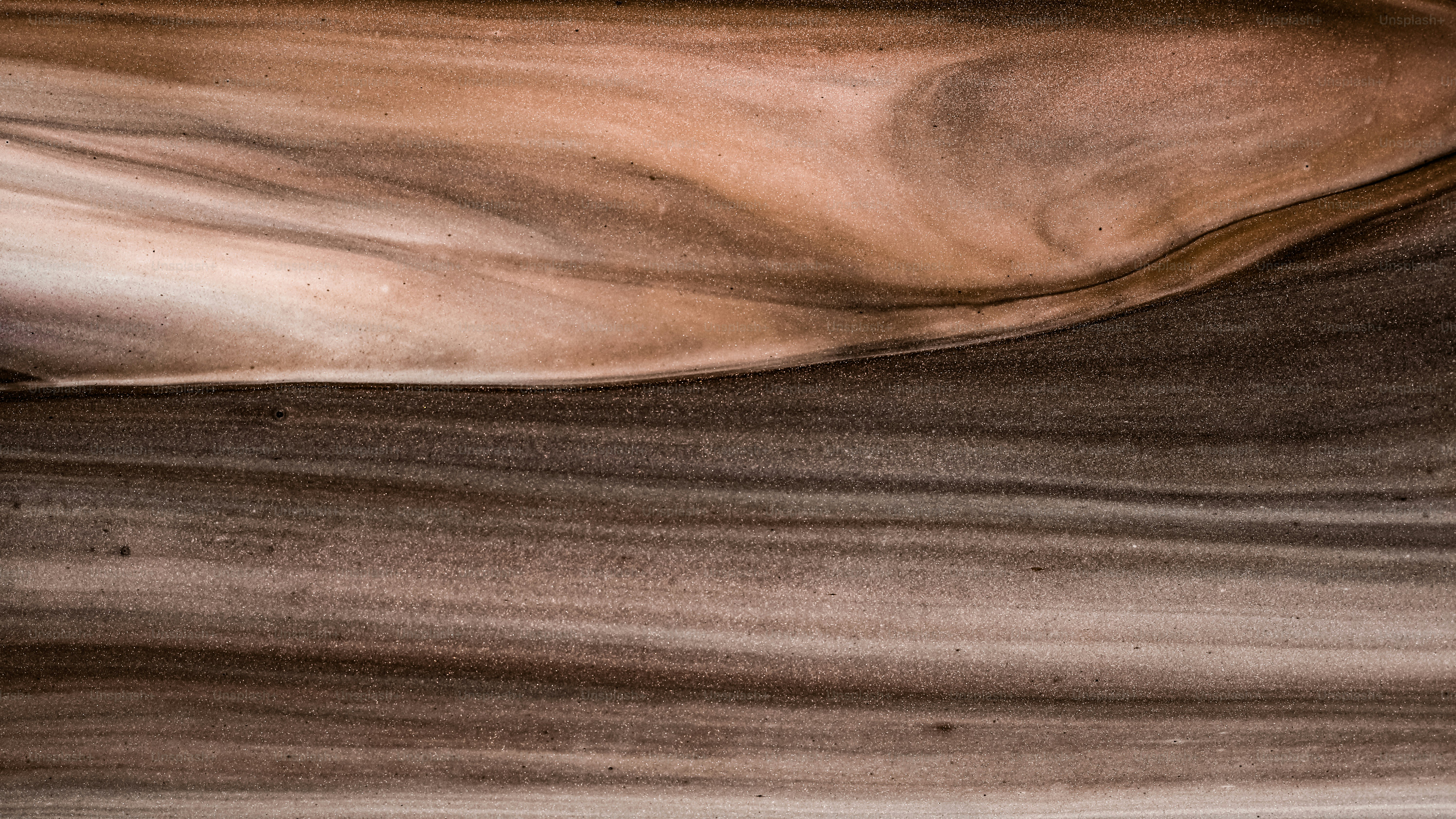 A close up of a brown and white material