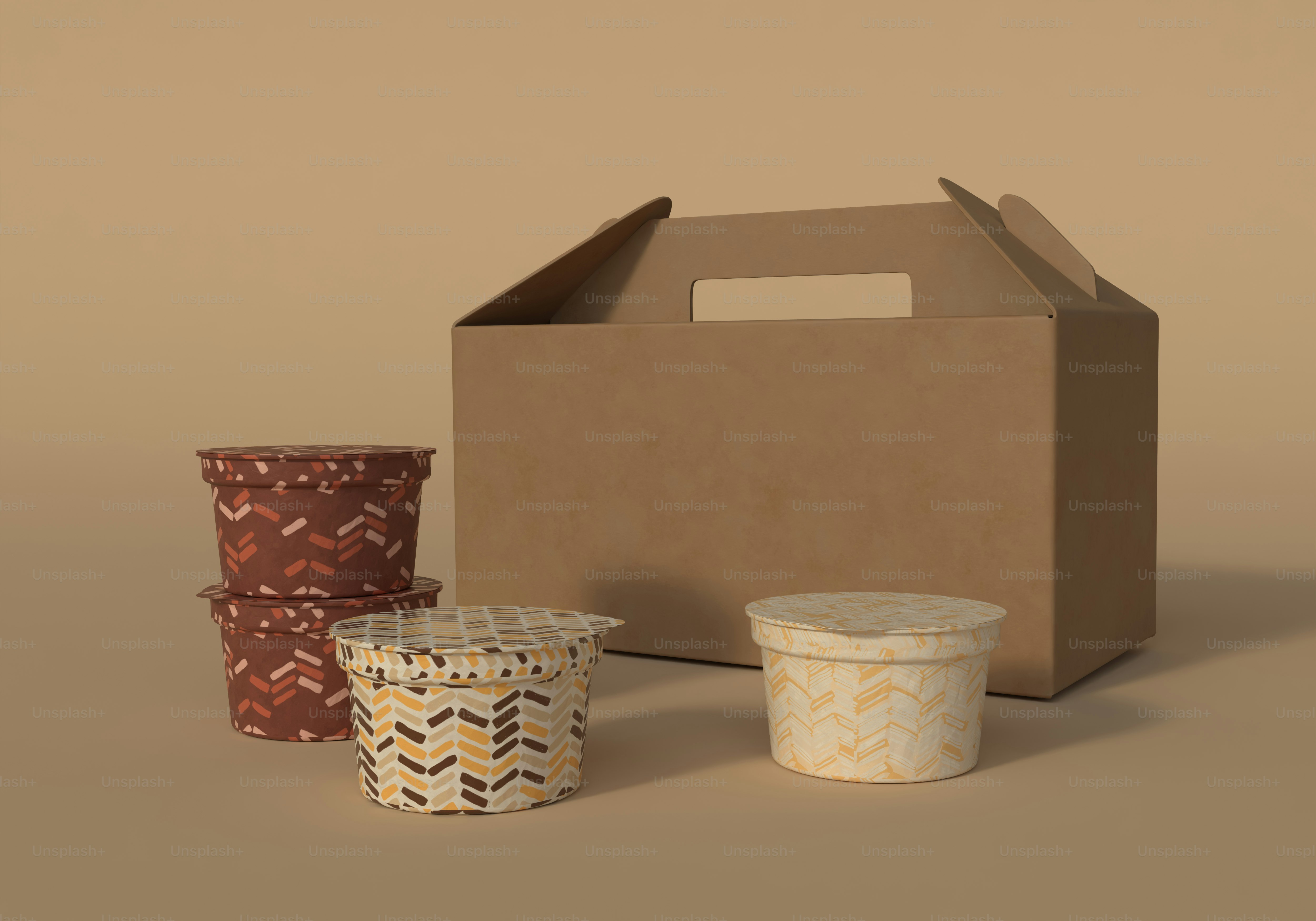 A cardboard box, two cups, and a box on a brown background