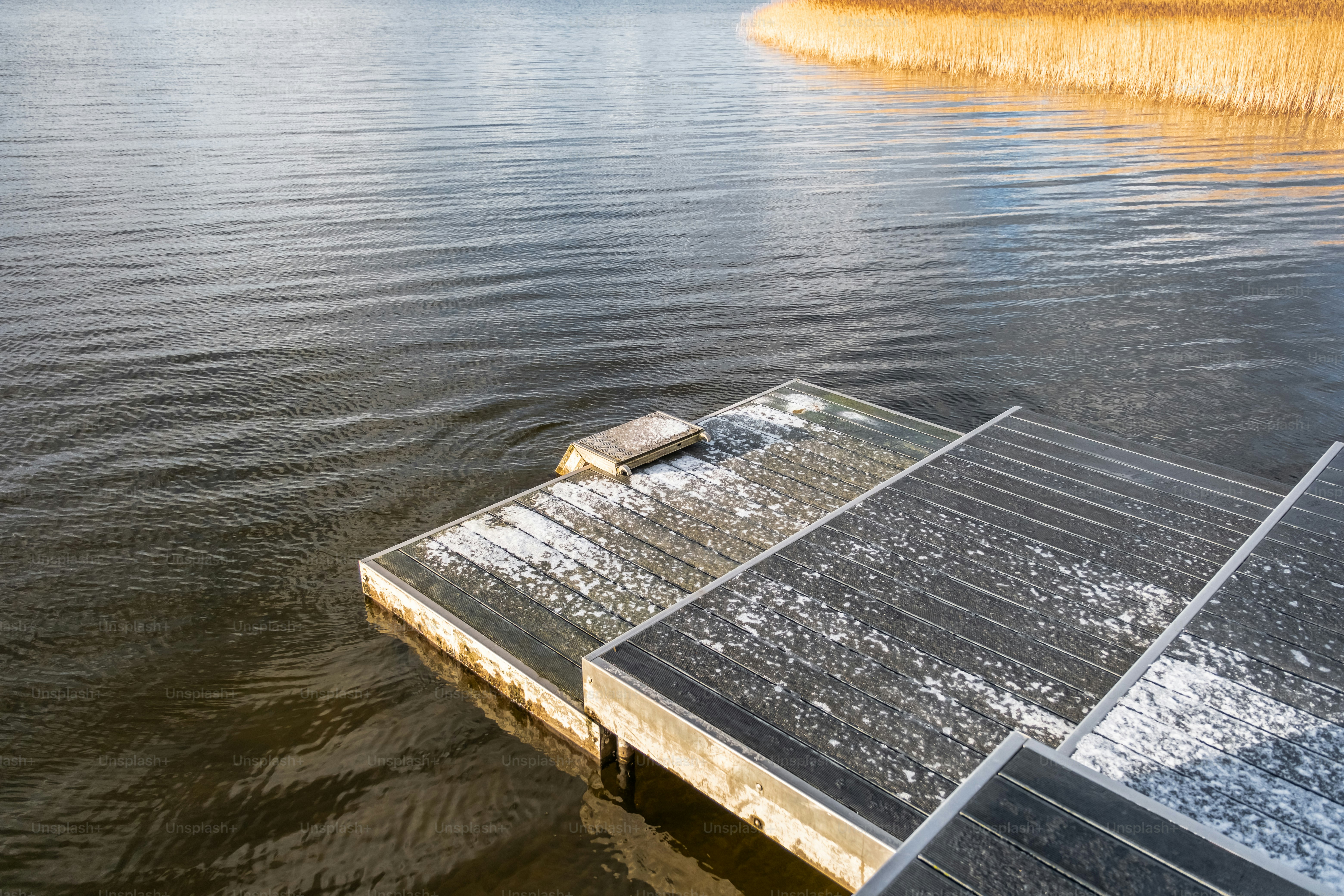 A boat floating on top of a body of water