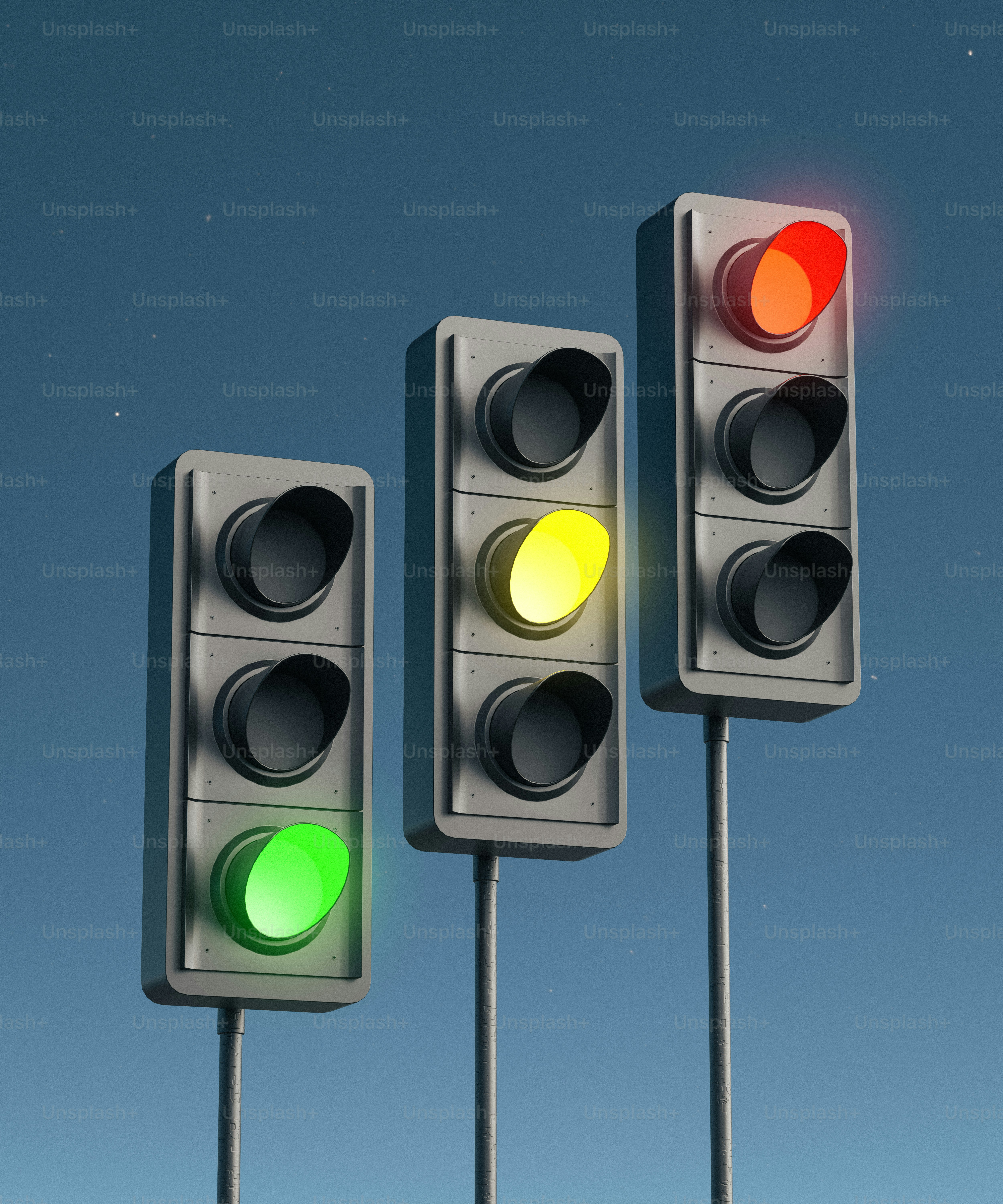 Tres semáforos con un cielo azul al fondo