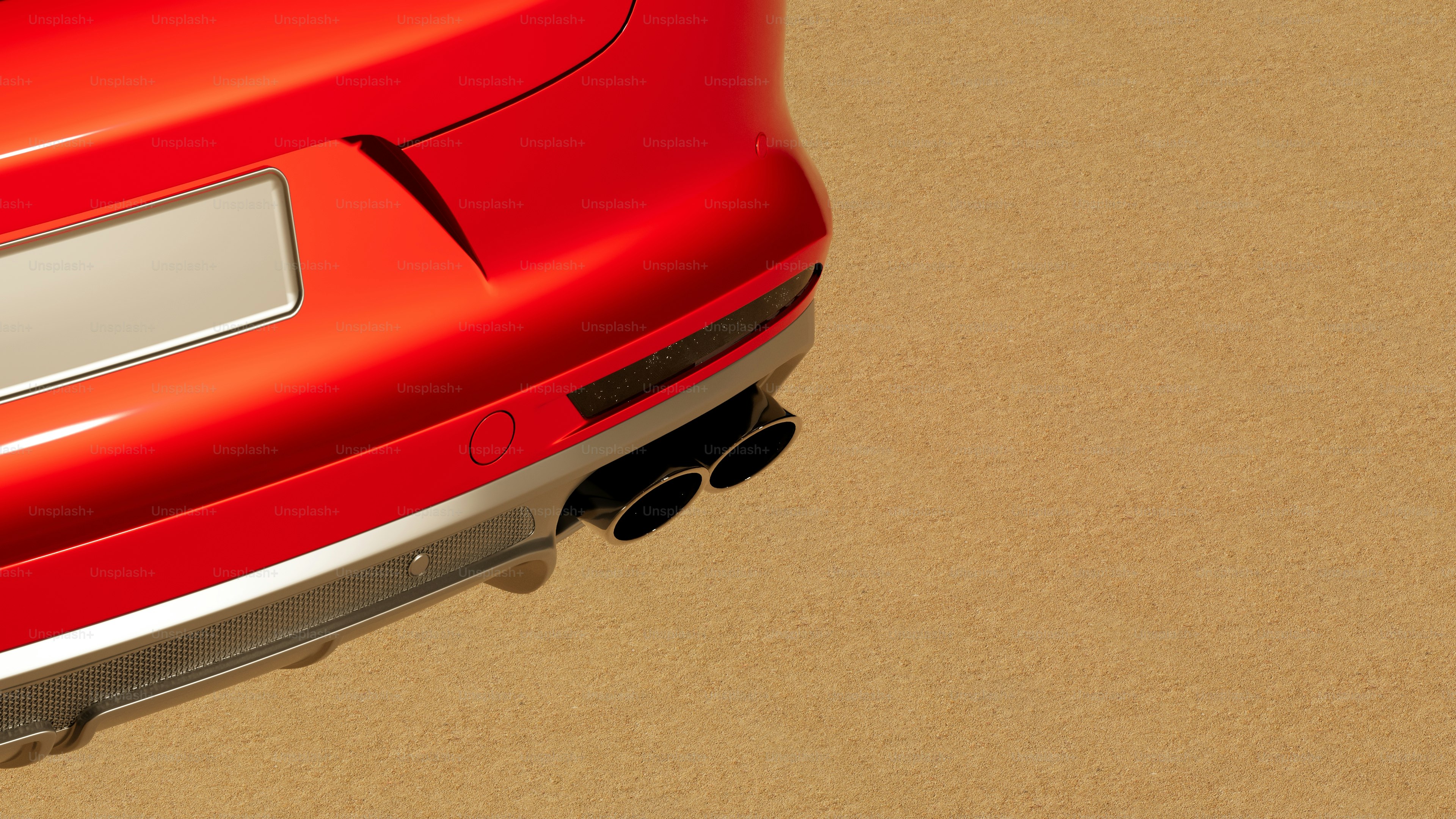 A close up of the rear end of a red car