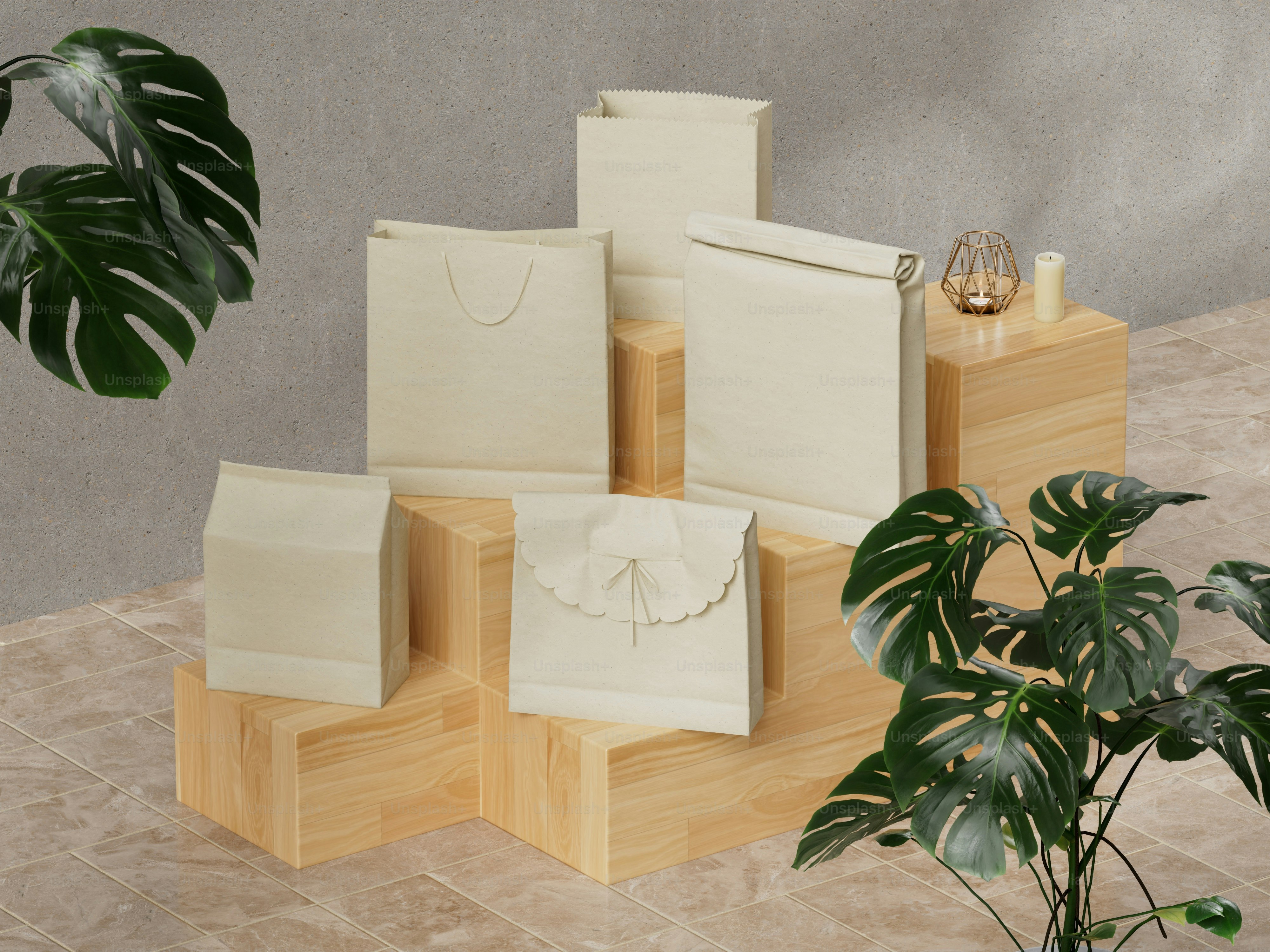 A table with a potted plant and several pieces of paper on it