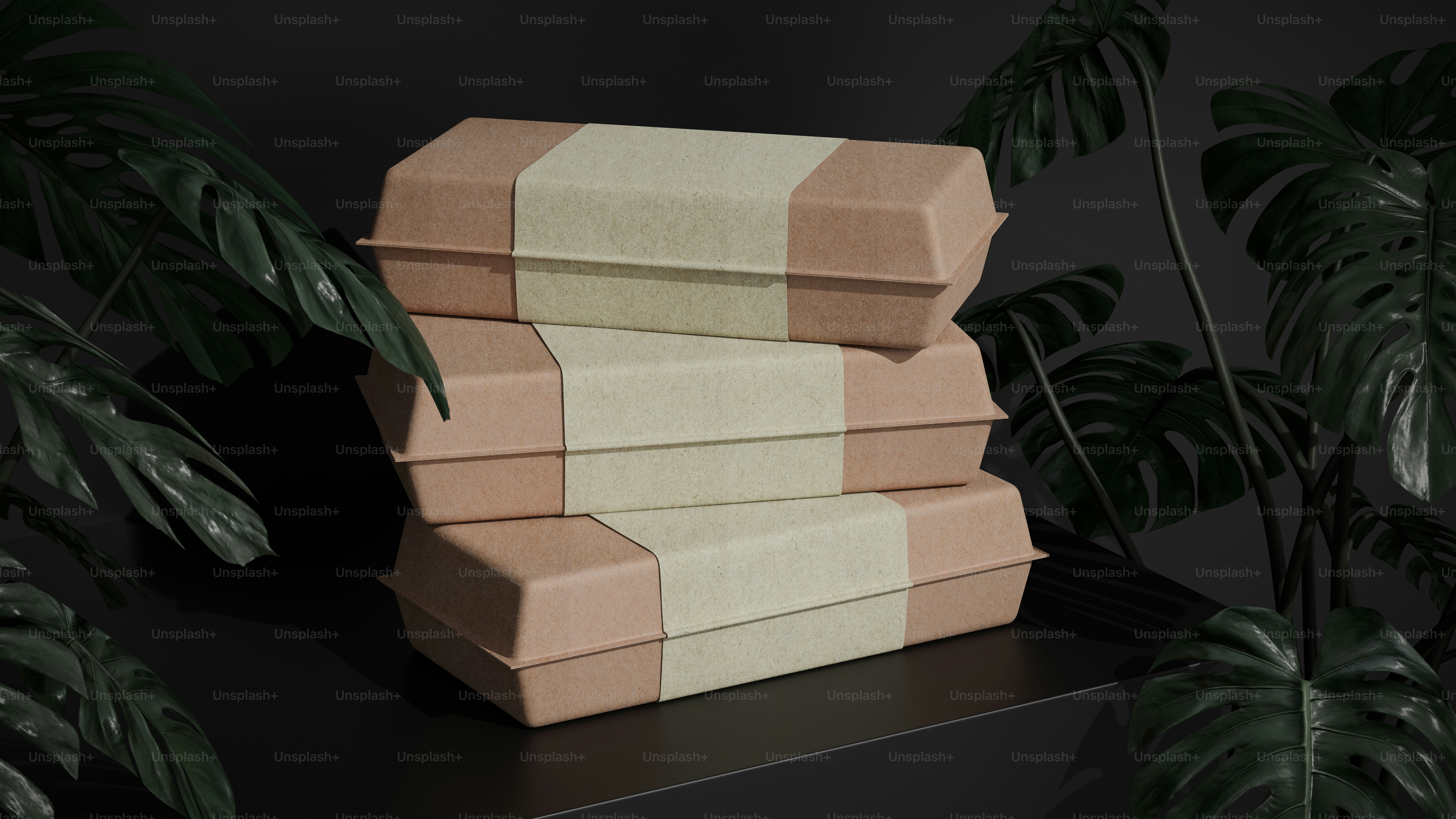 A stack of boxes sitting on top of a table photo – Sustainable Image on ...