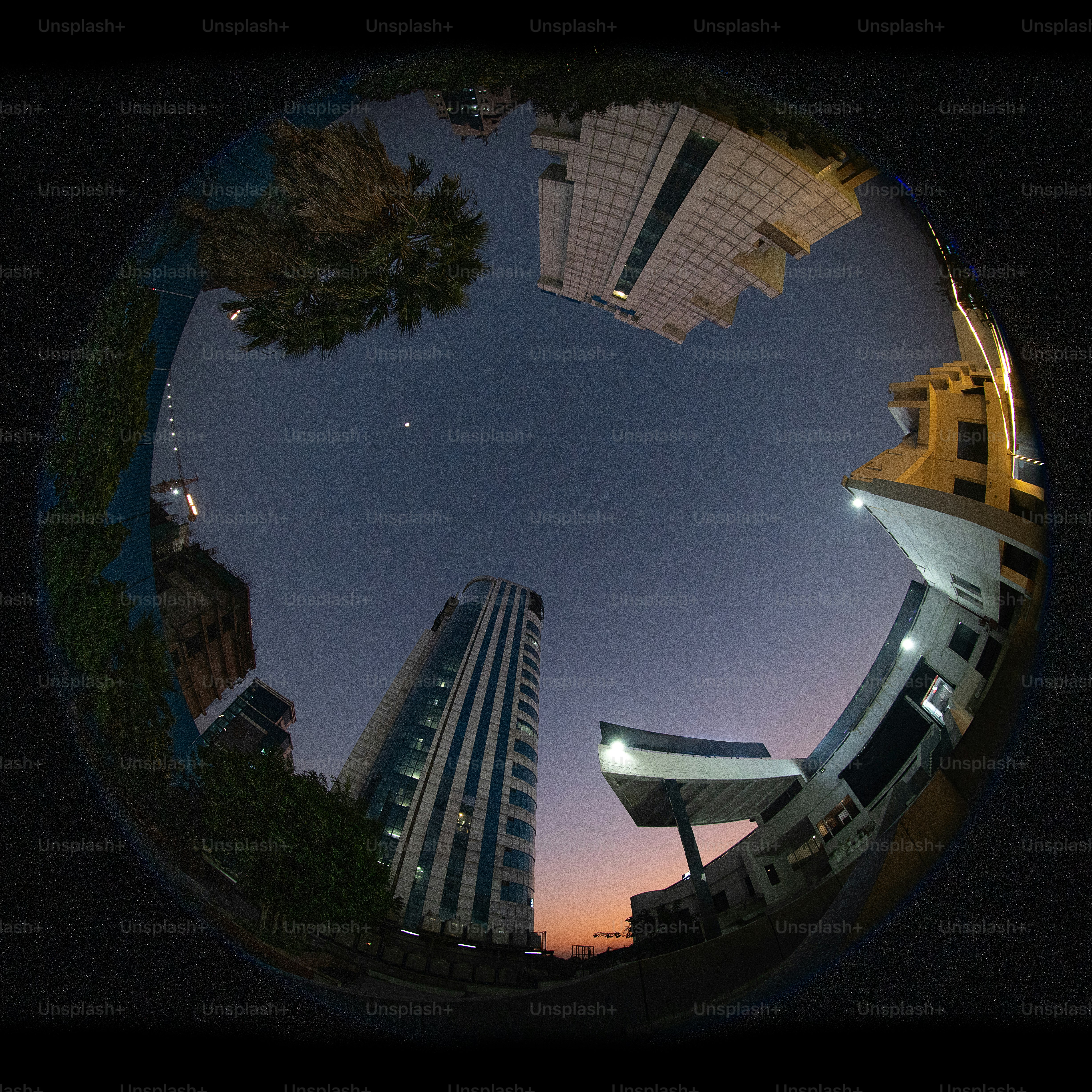 A fish eye view of a city at night