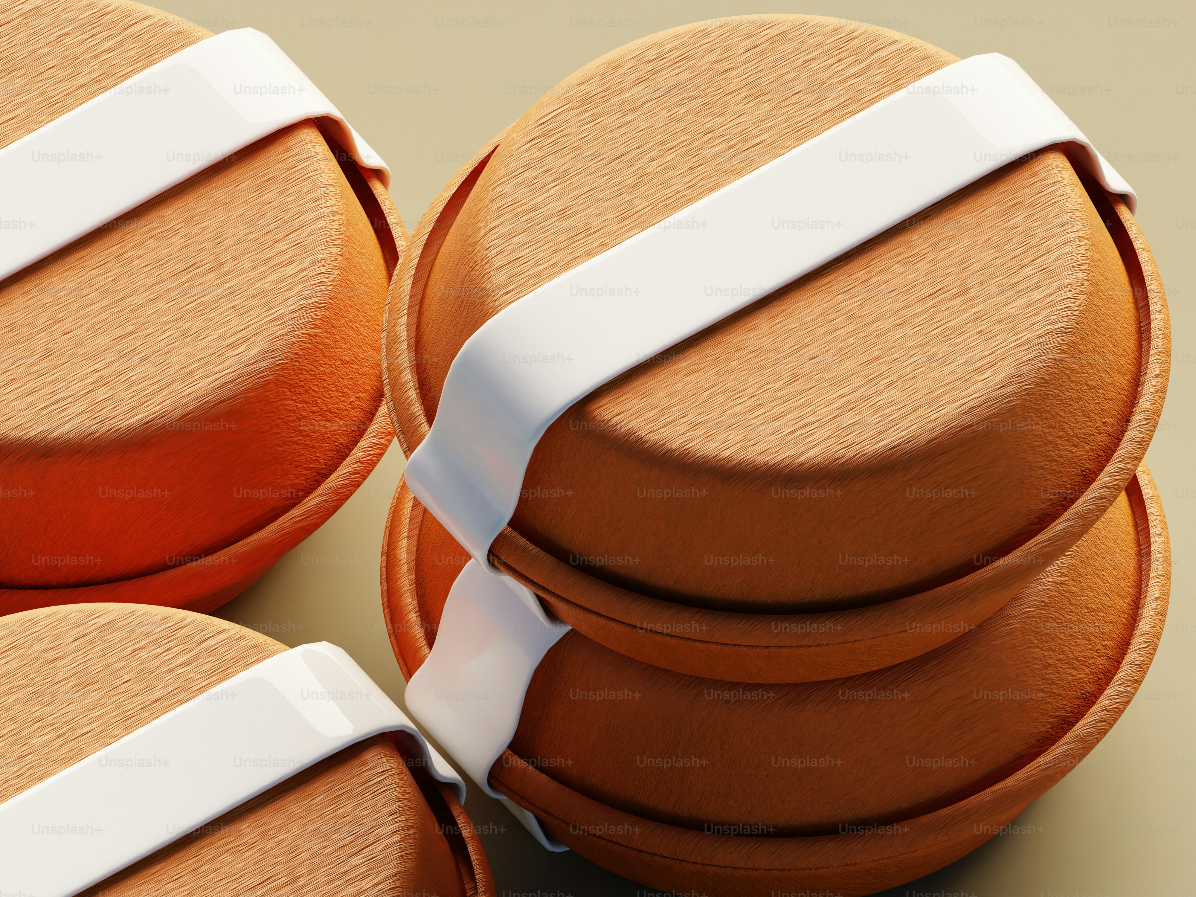 A group of oranges with white ribbons on them