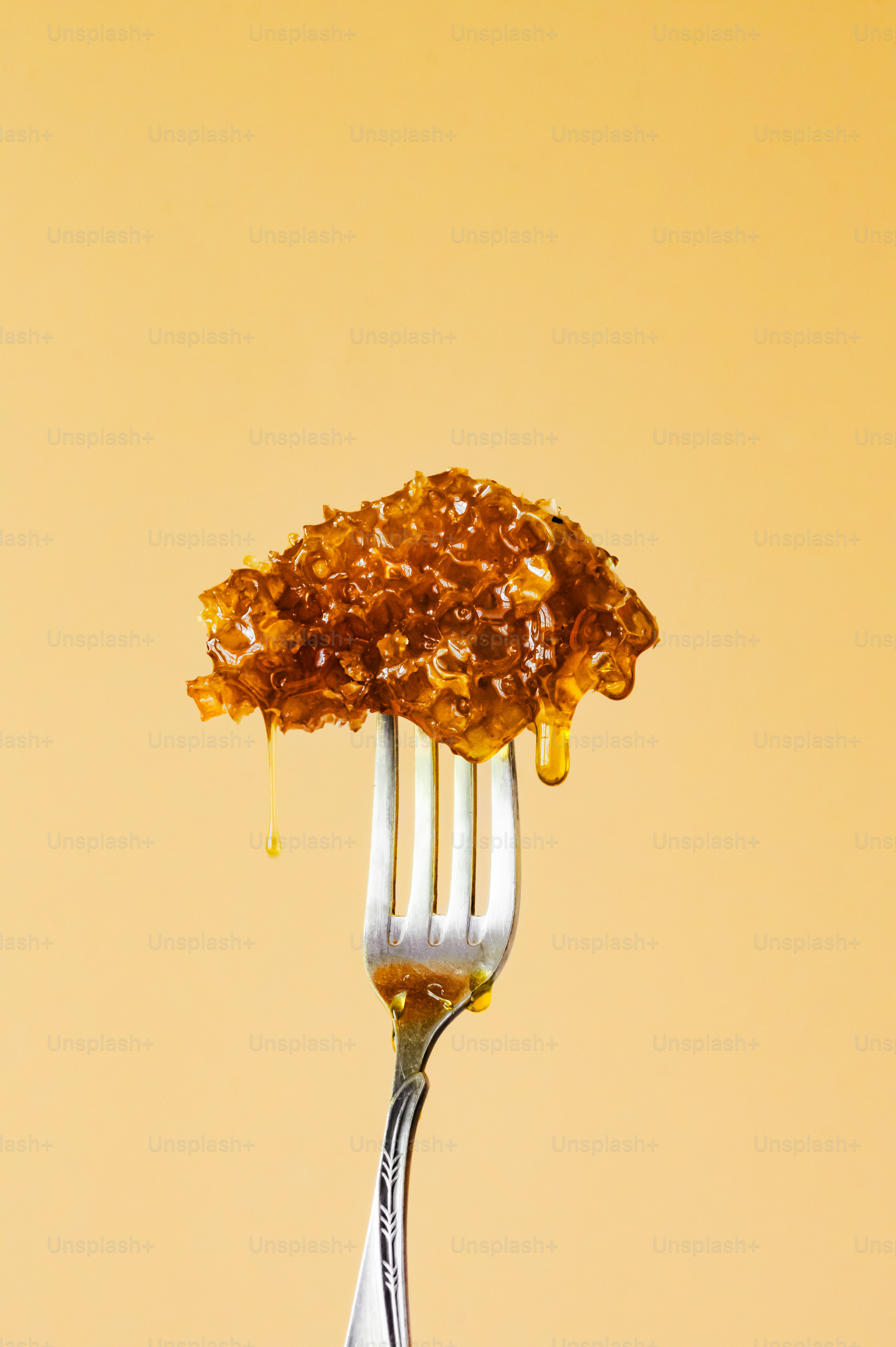 A fork that has some food on it