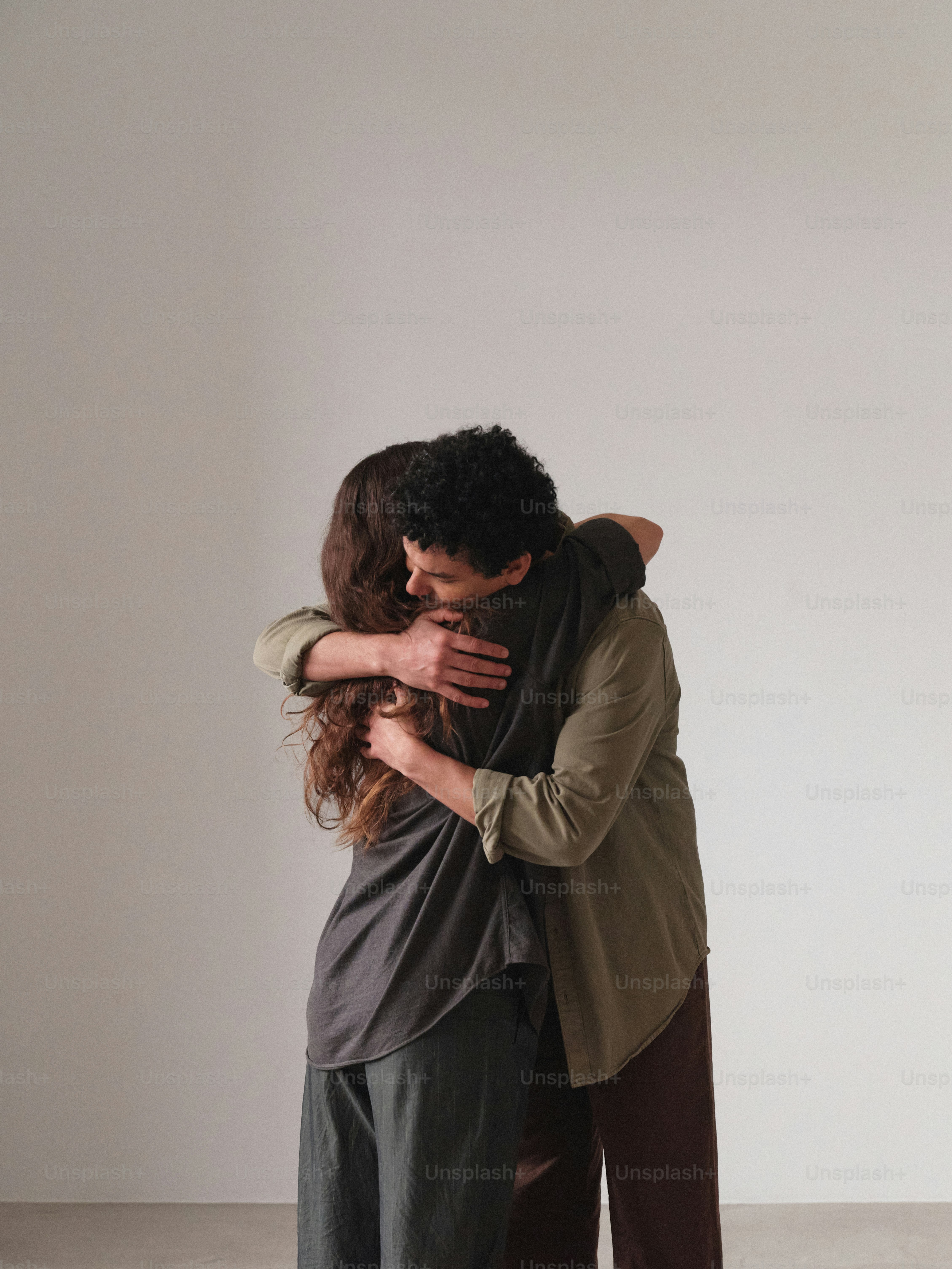 A man and a woman embracing each other